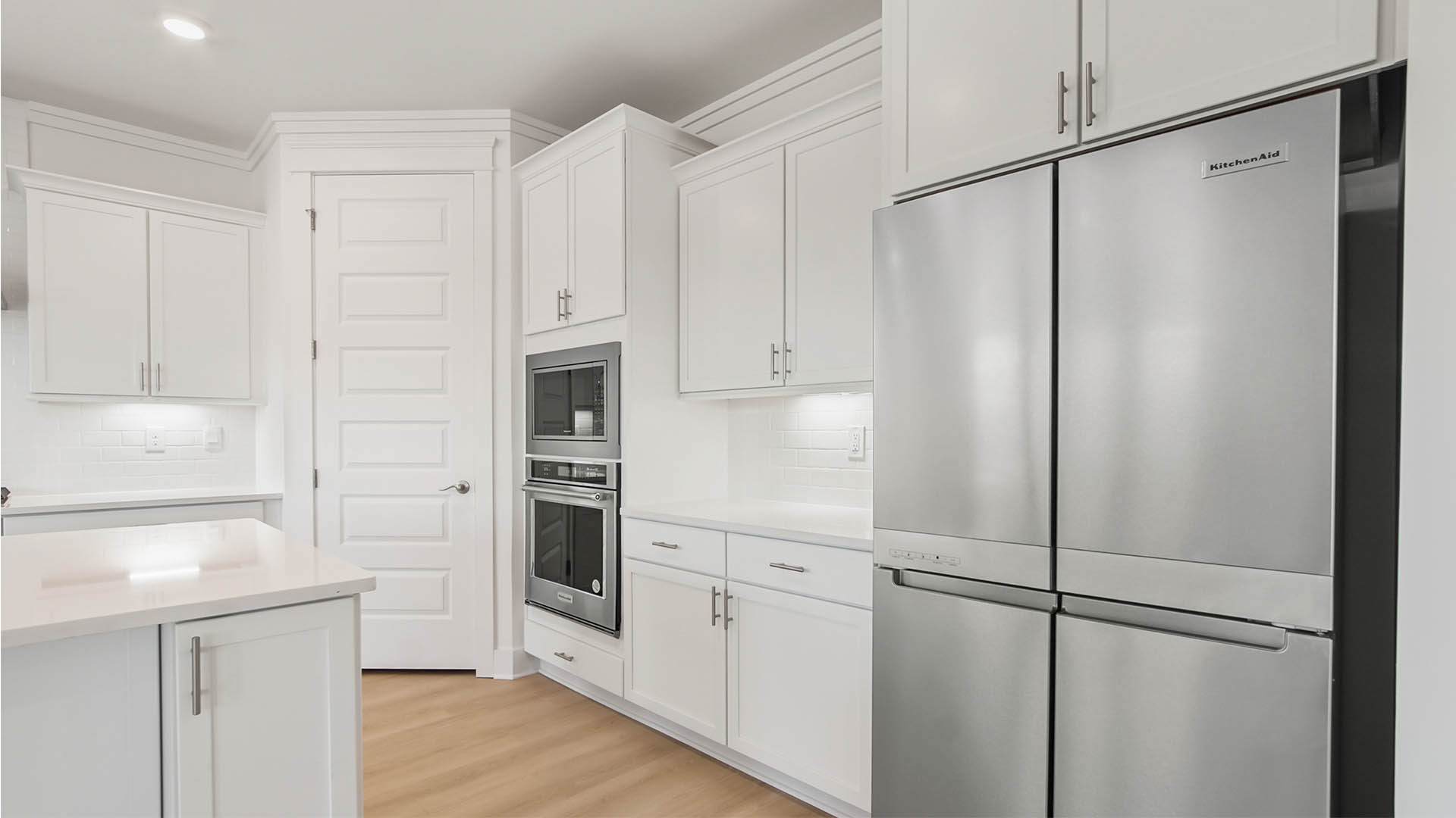 Large pantry and beautiful cabinetry with built in appliances