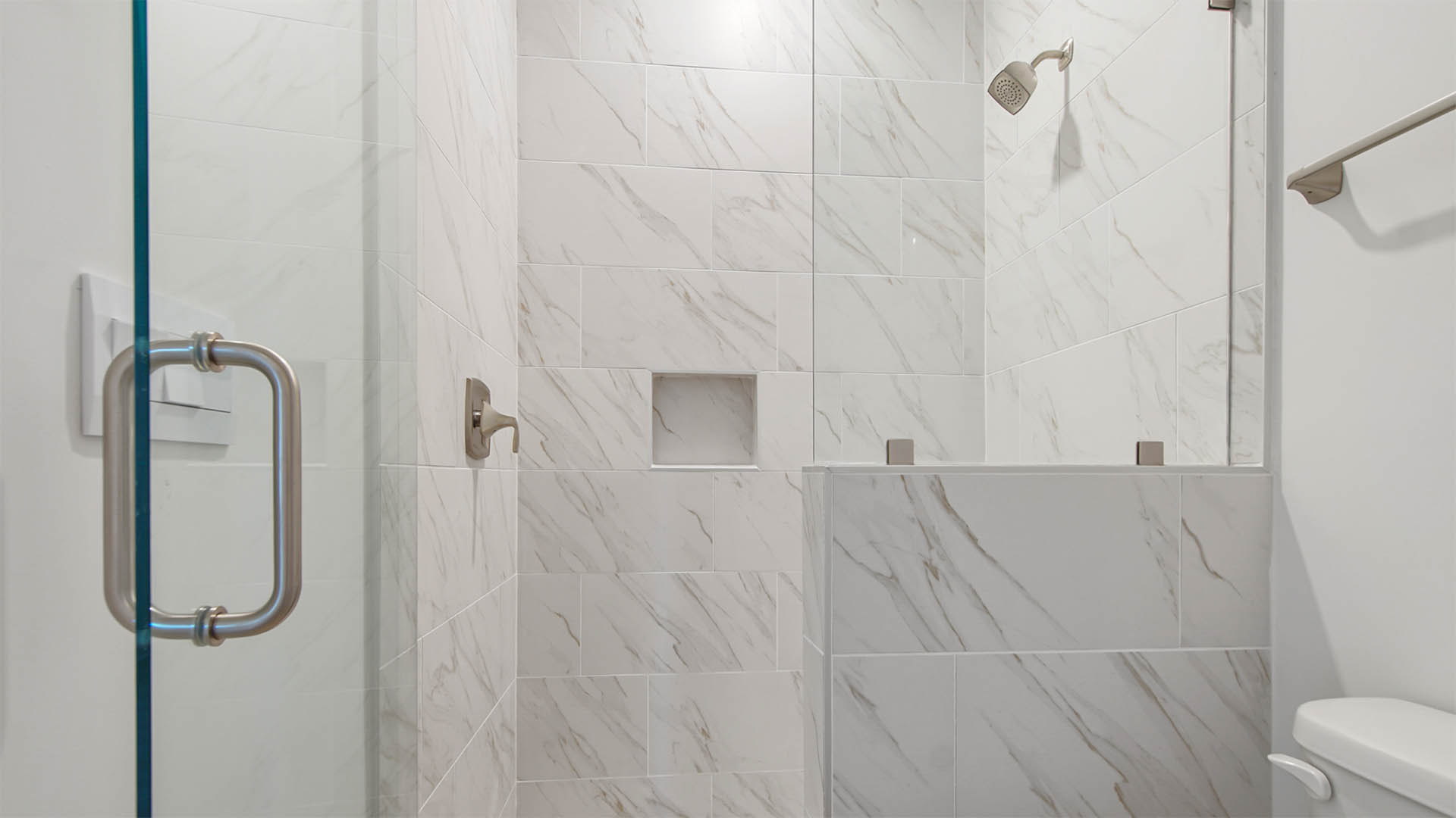 Luxurious tile shower and glass enclosure