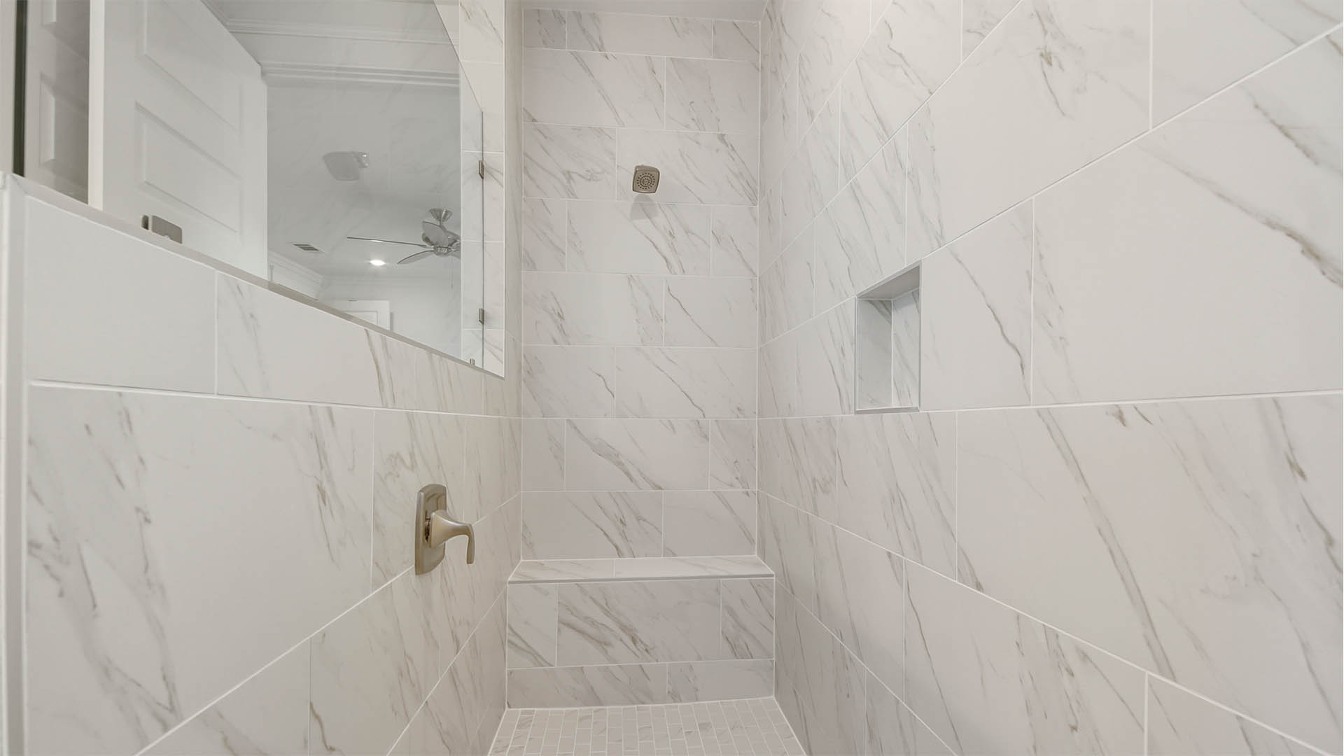 Luxurious shower with bench