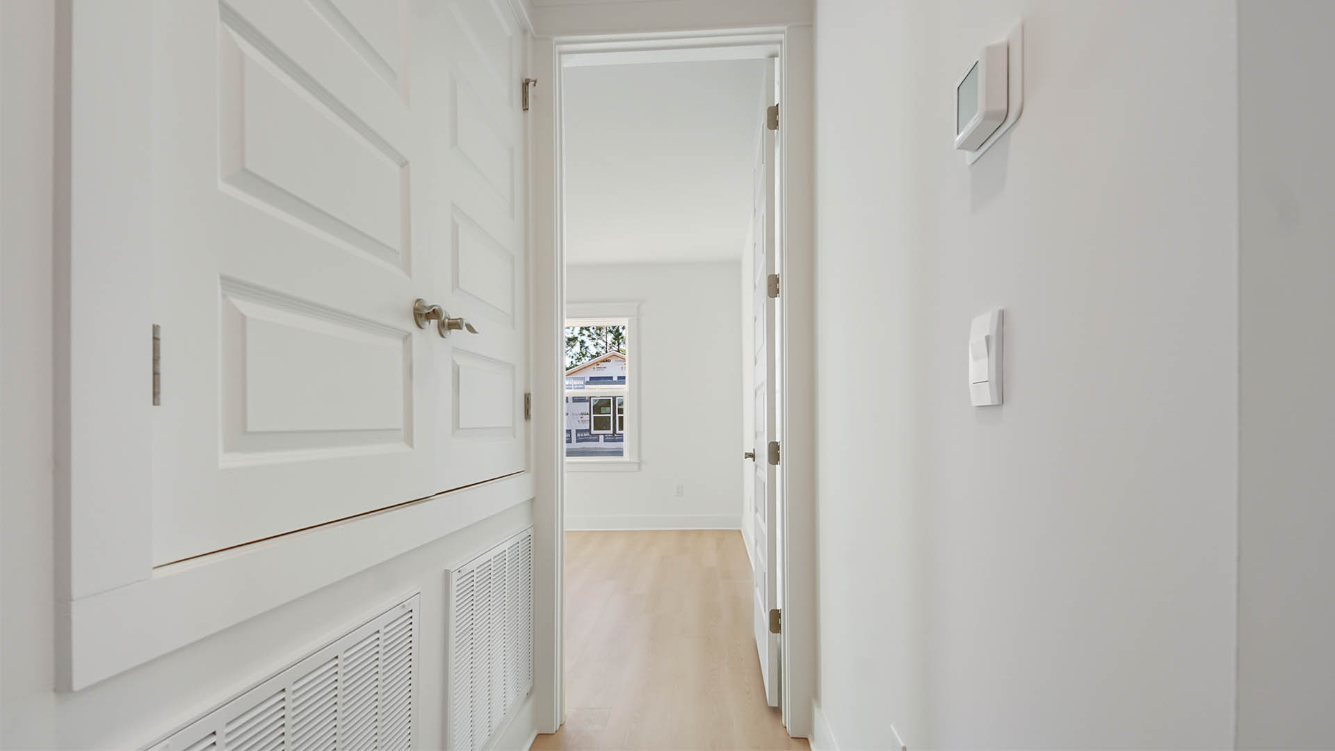 Private hallway leading to bedroom four