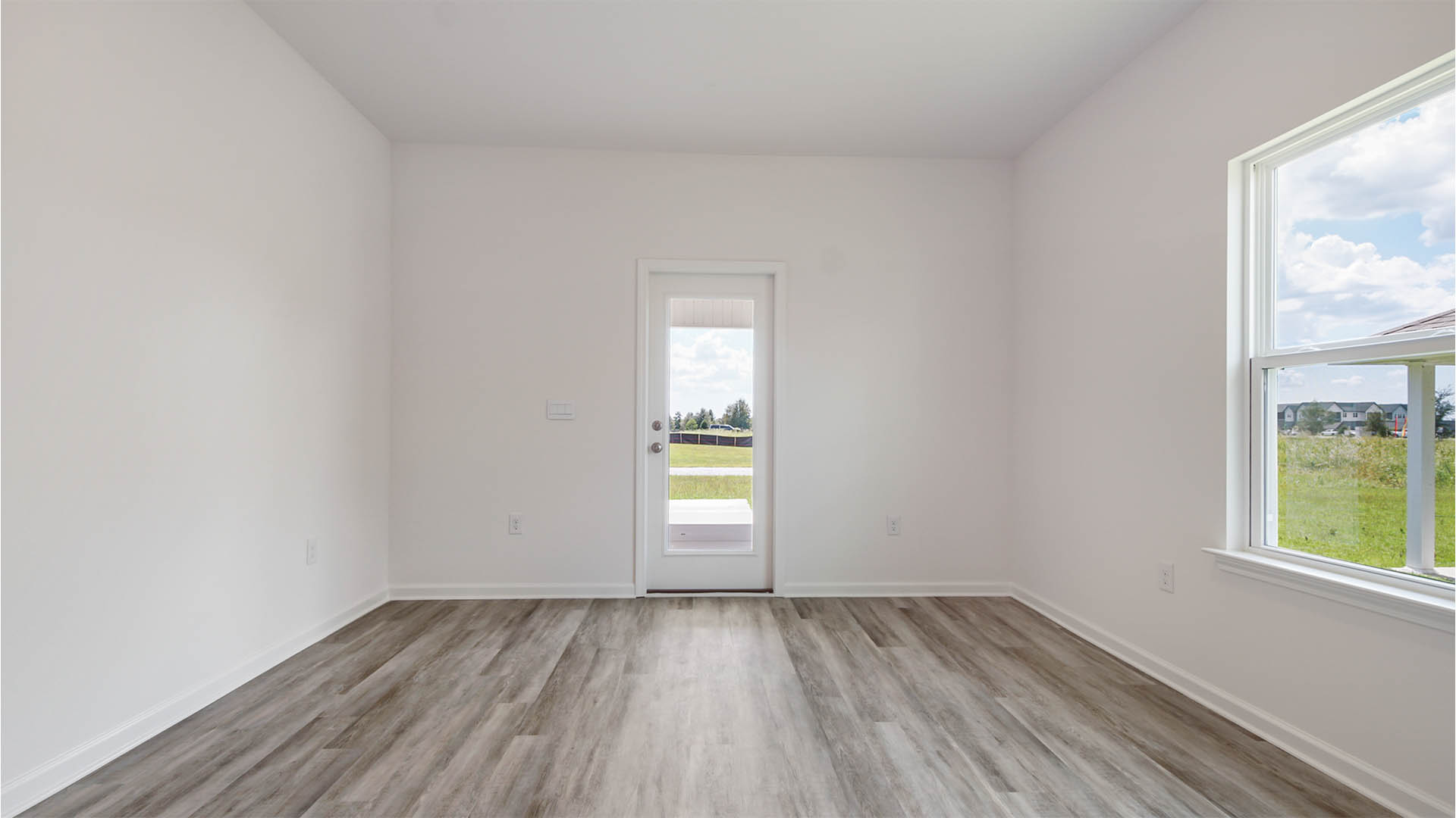 Living area with access to the covered patio