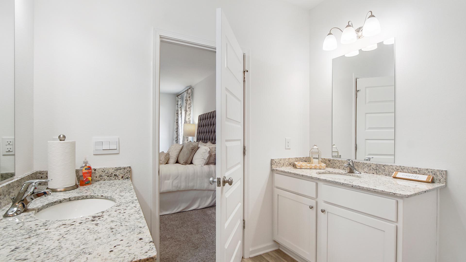 The primary bathroom has a vanity