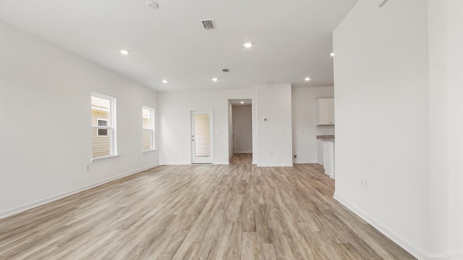 Open and spacious living area with EVP flooring