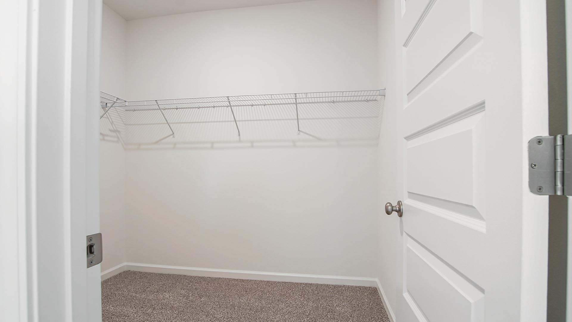 The primary bedroom has a large closet