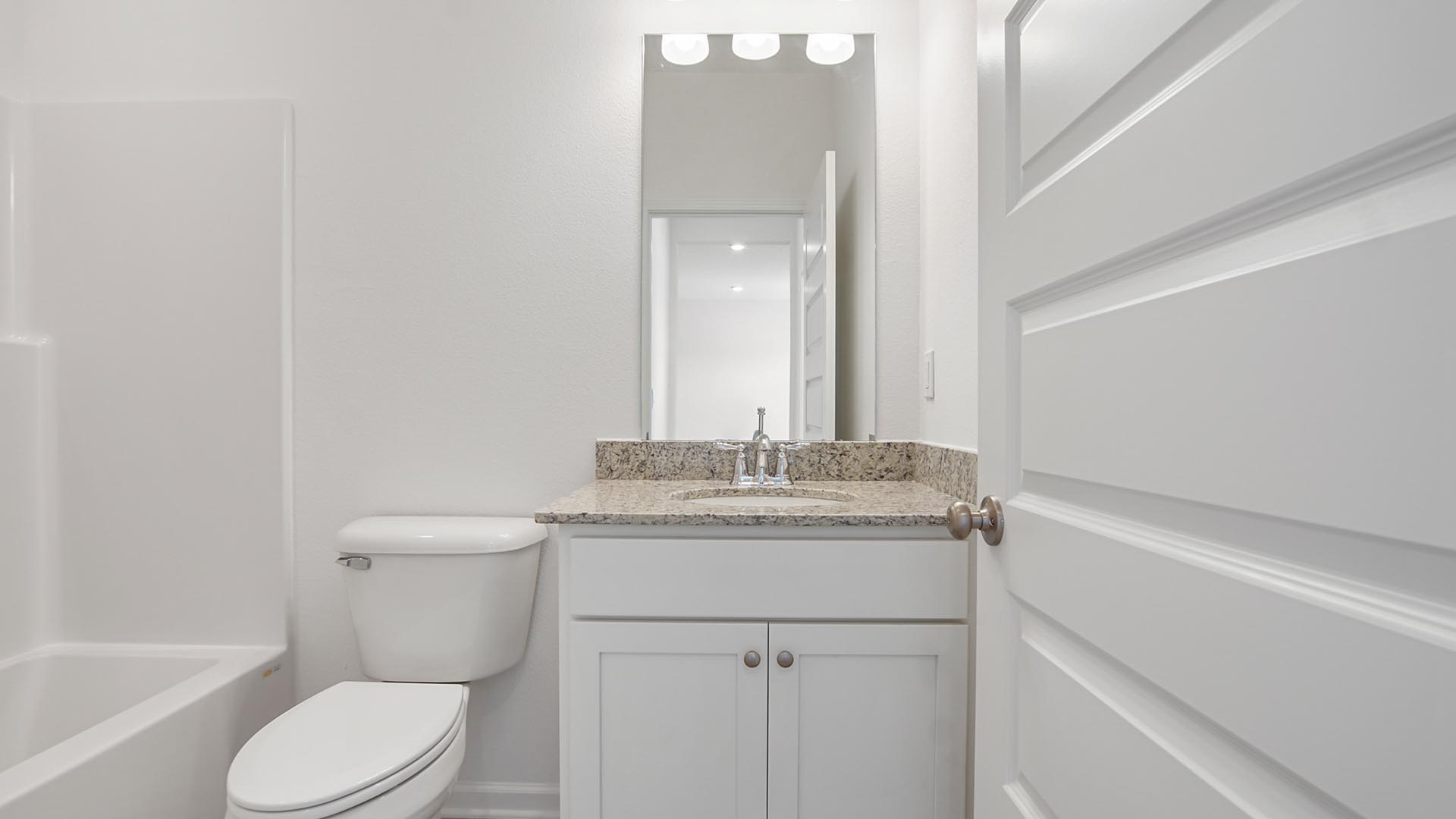 Main level full bathroom with single vanity