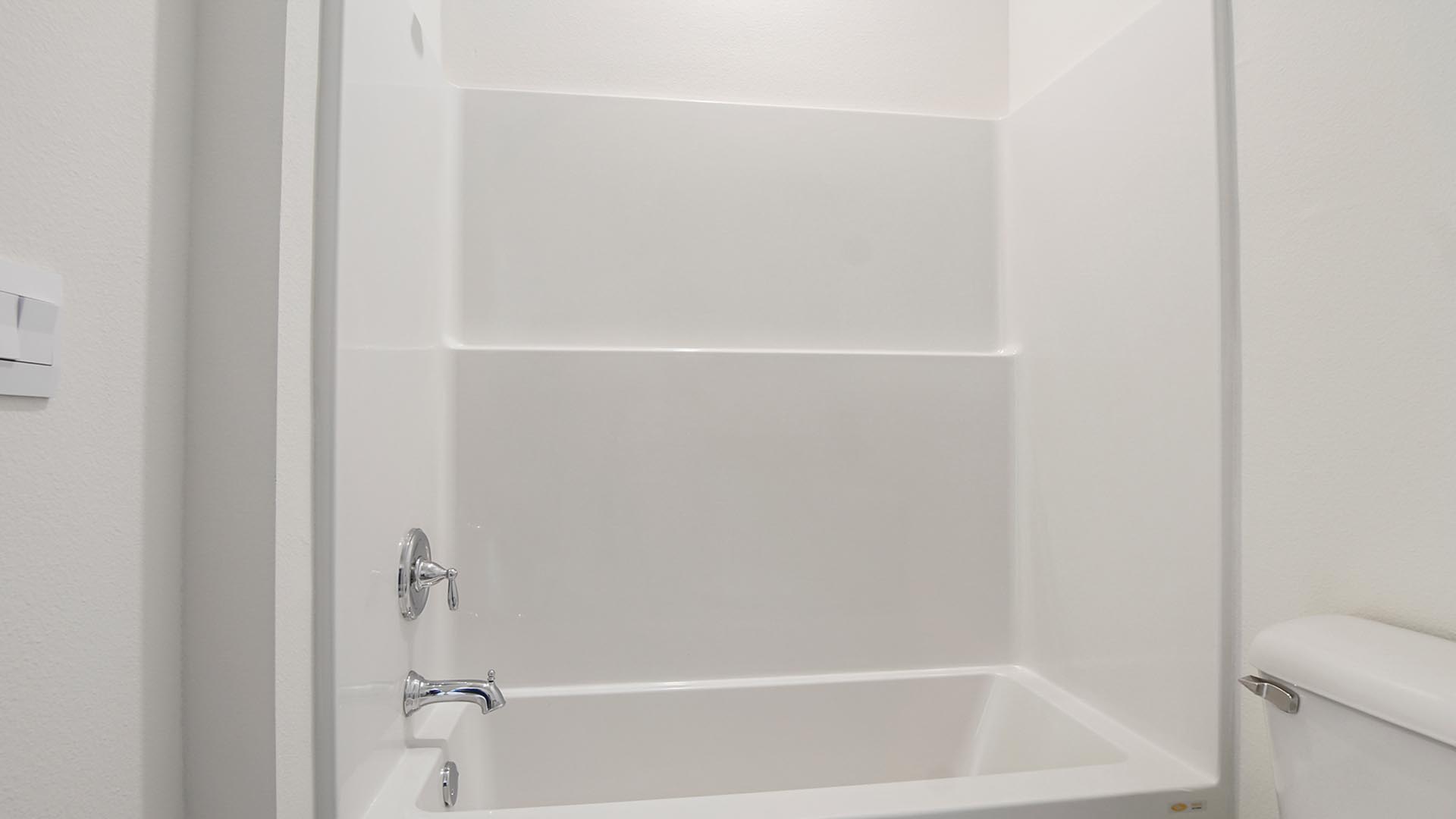 Main level bathroom has a shower tub combination