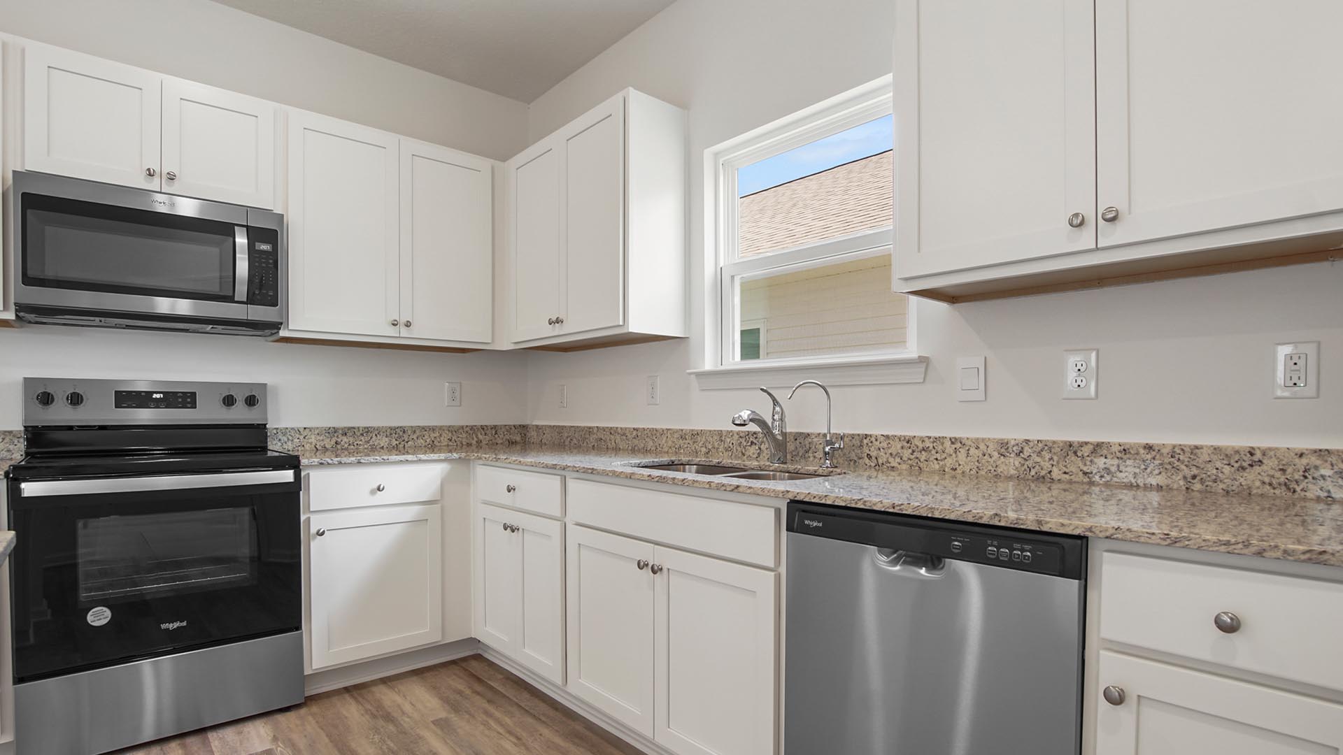 Beautiful white cabinetry with plenty of storage space