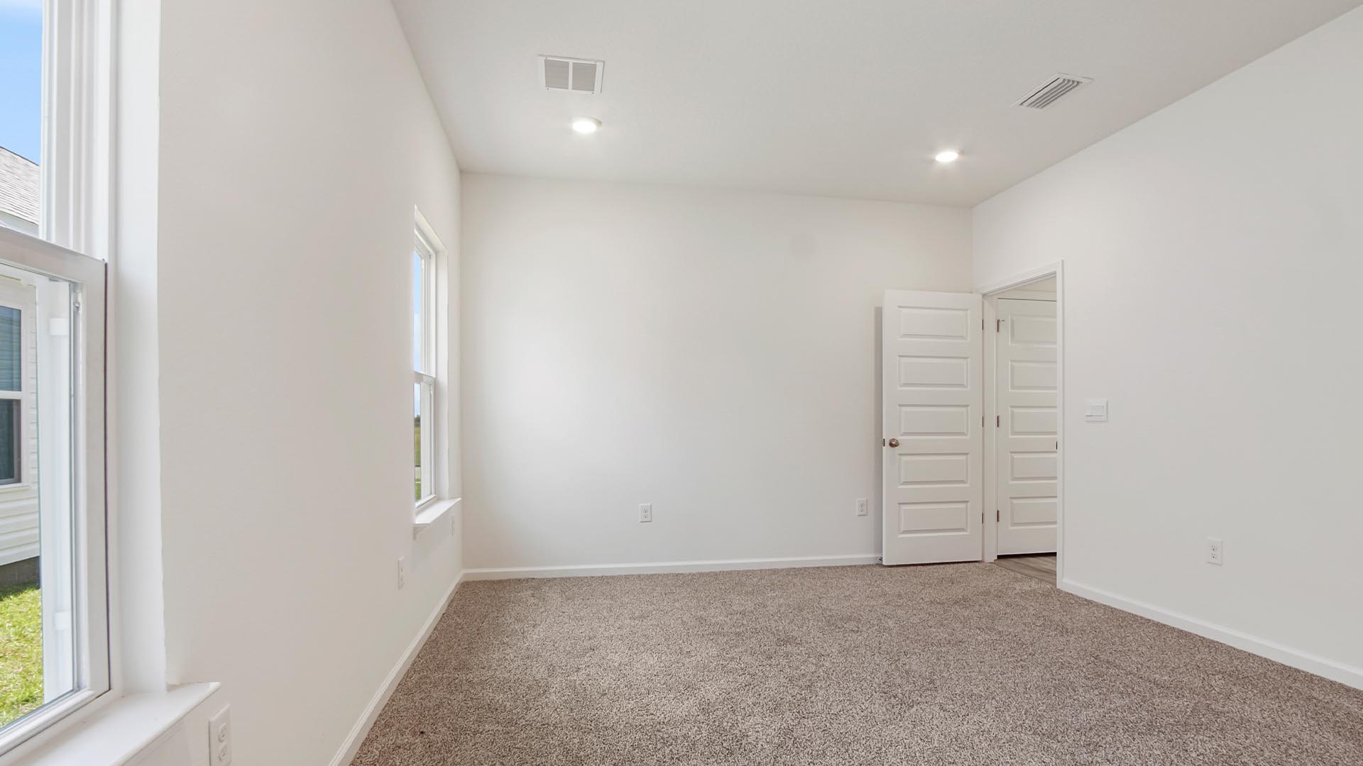 The primary bedroom features an ensuite bathroom