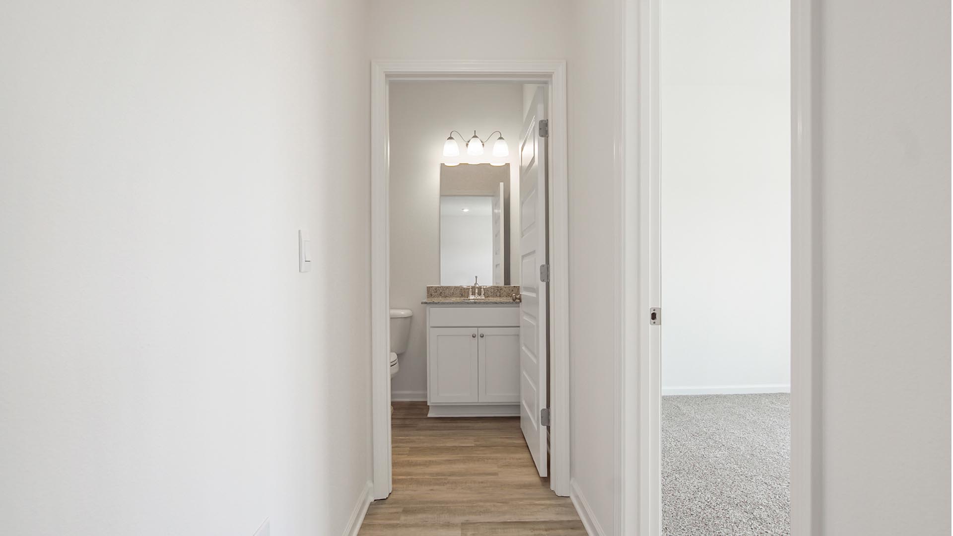 Hall leading to the downstairs guest bedroom