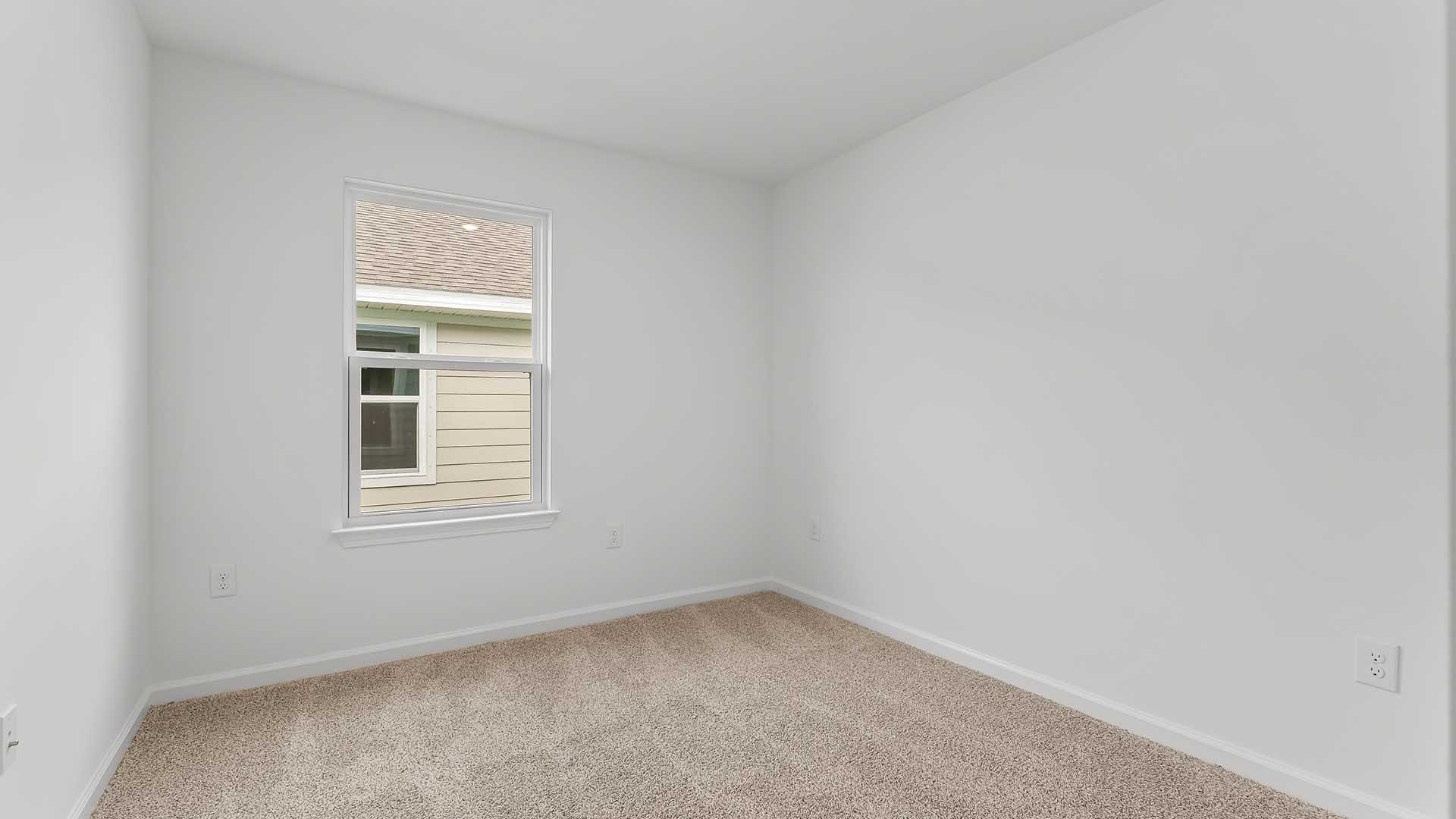 Bedroom four has ample closet space and could be used as an office or den