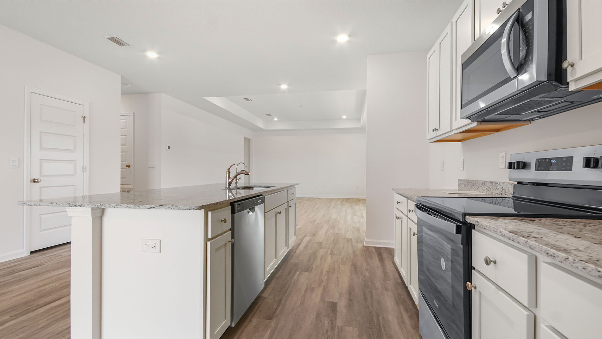 Upper and lower cabinetry allows for storage space