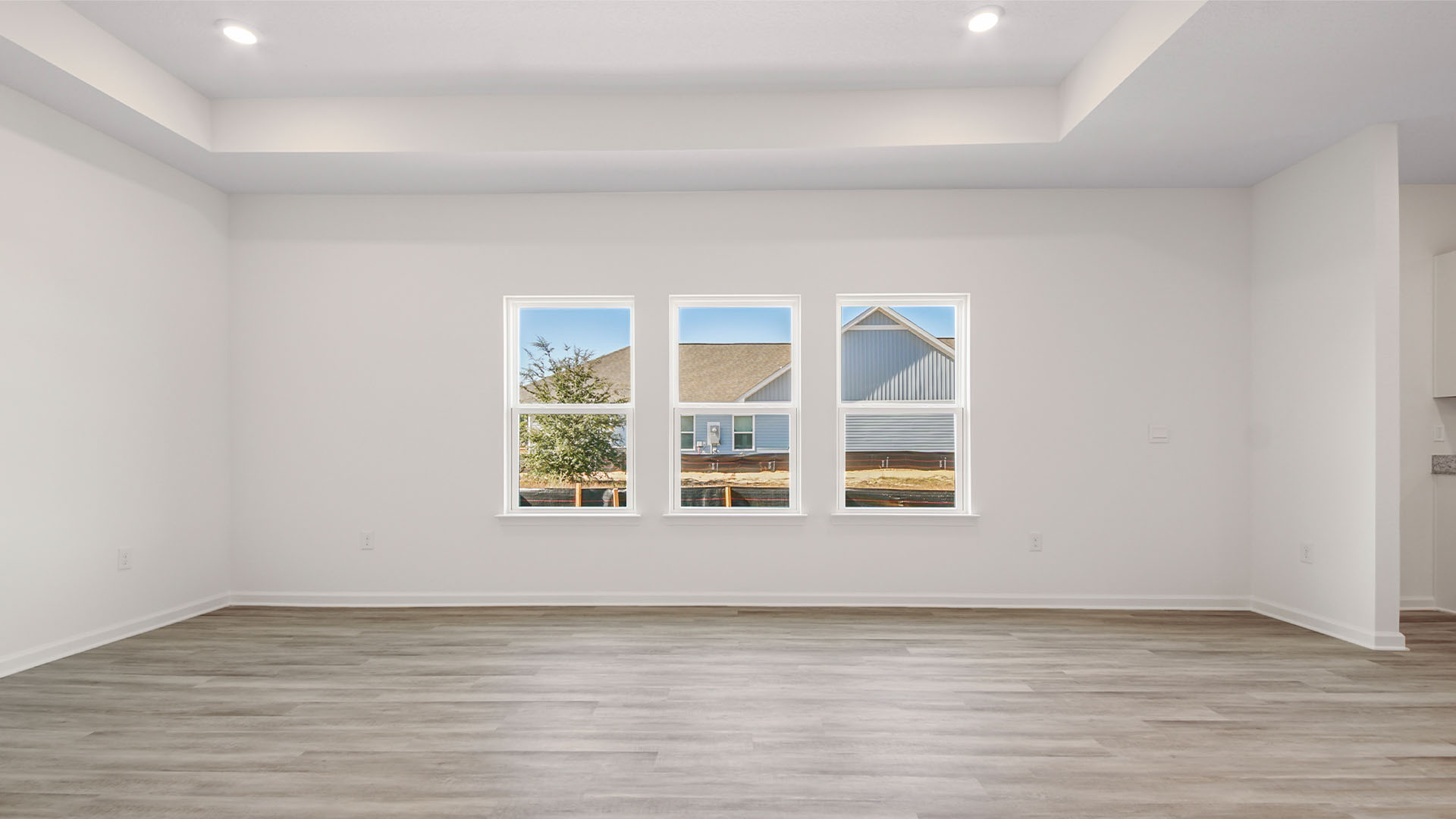 The main living area is illuminated with windows