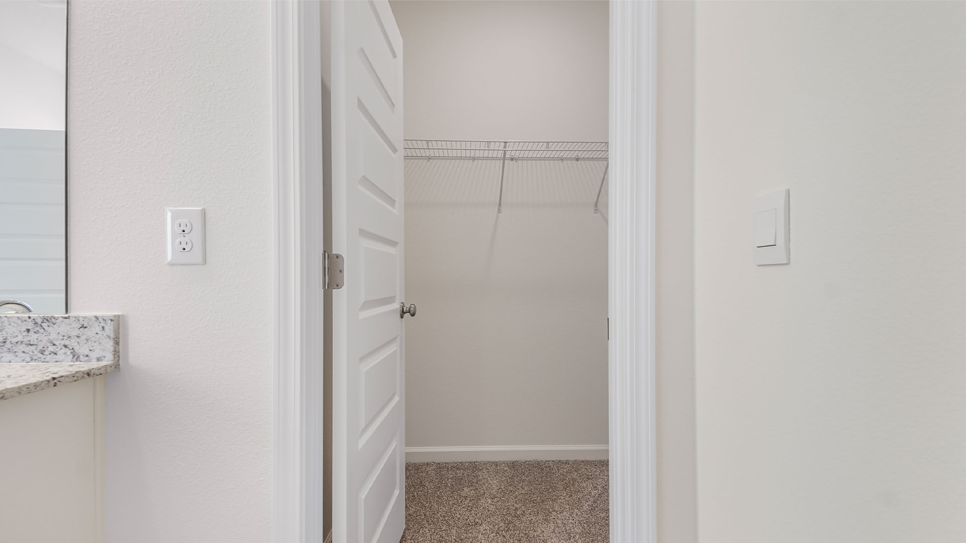 The primary bathroom has a spacious closet