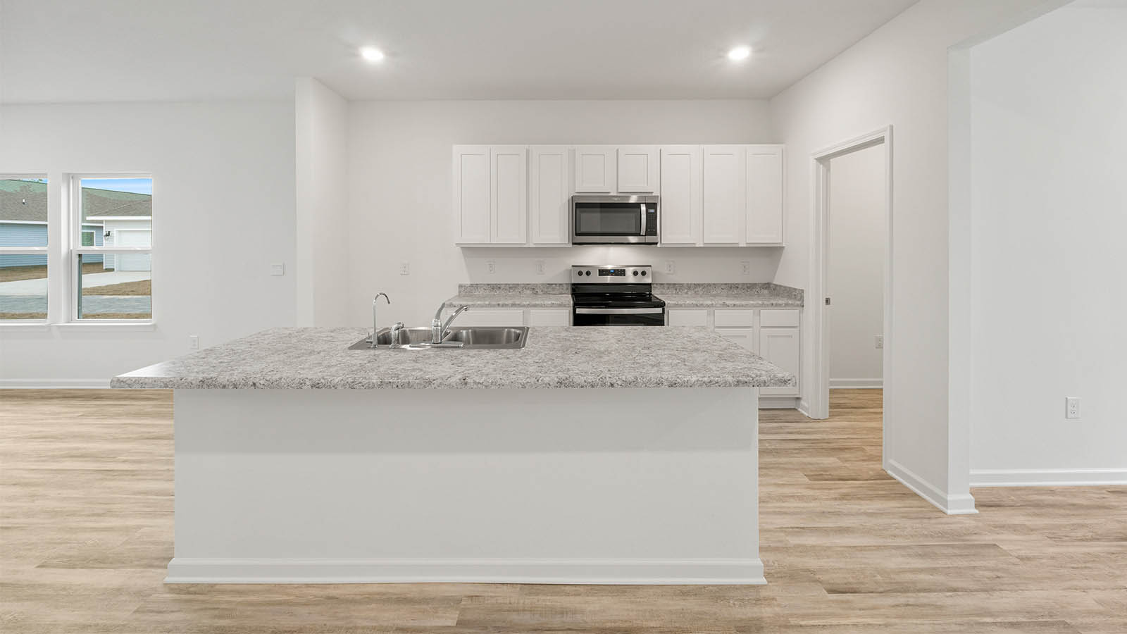 The center island features space for bar seating