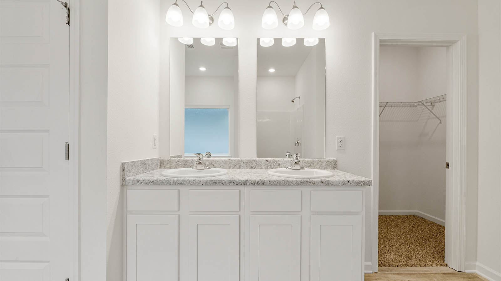 Primary bathroom with dual sink vanity