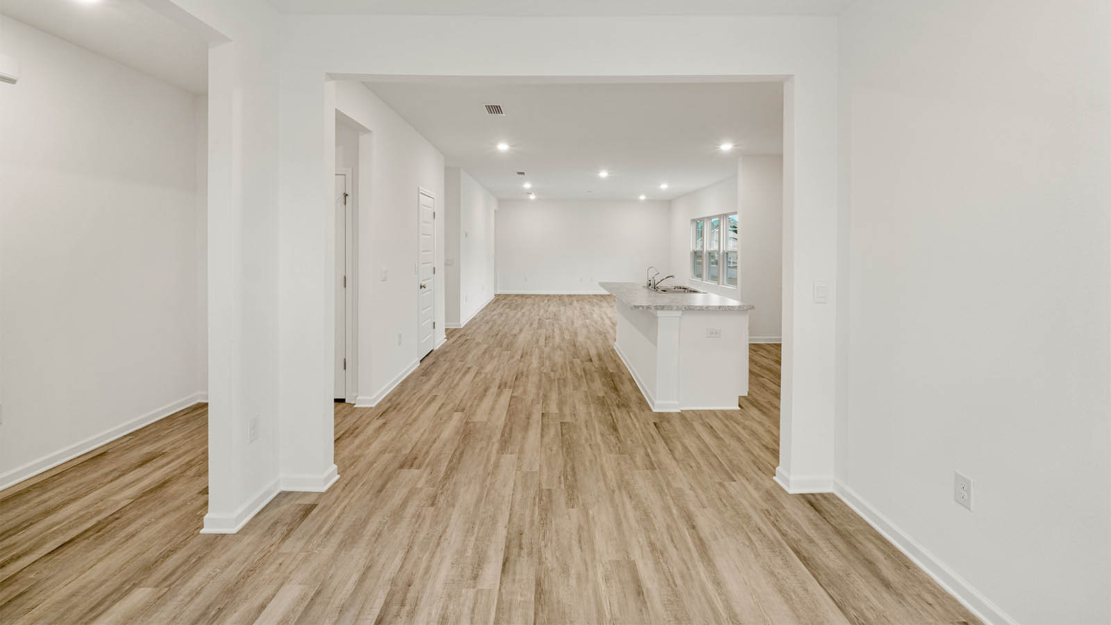 Foyer of the Mason floor plan leads to the spacious kitchen and living area