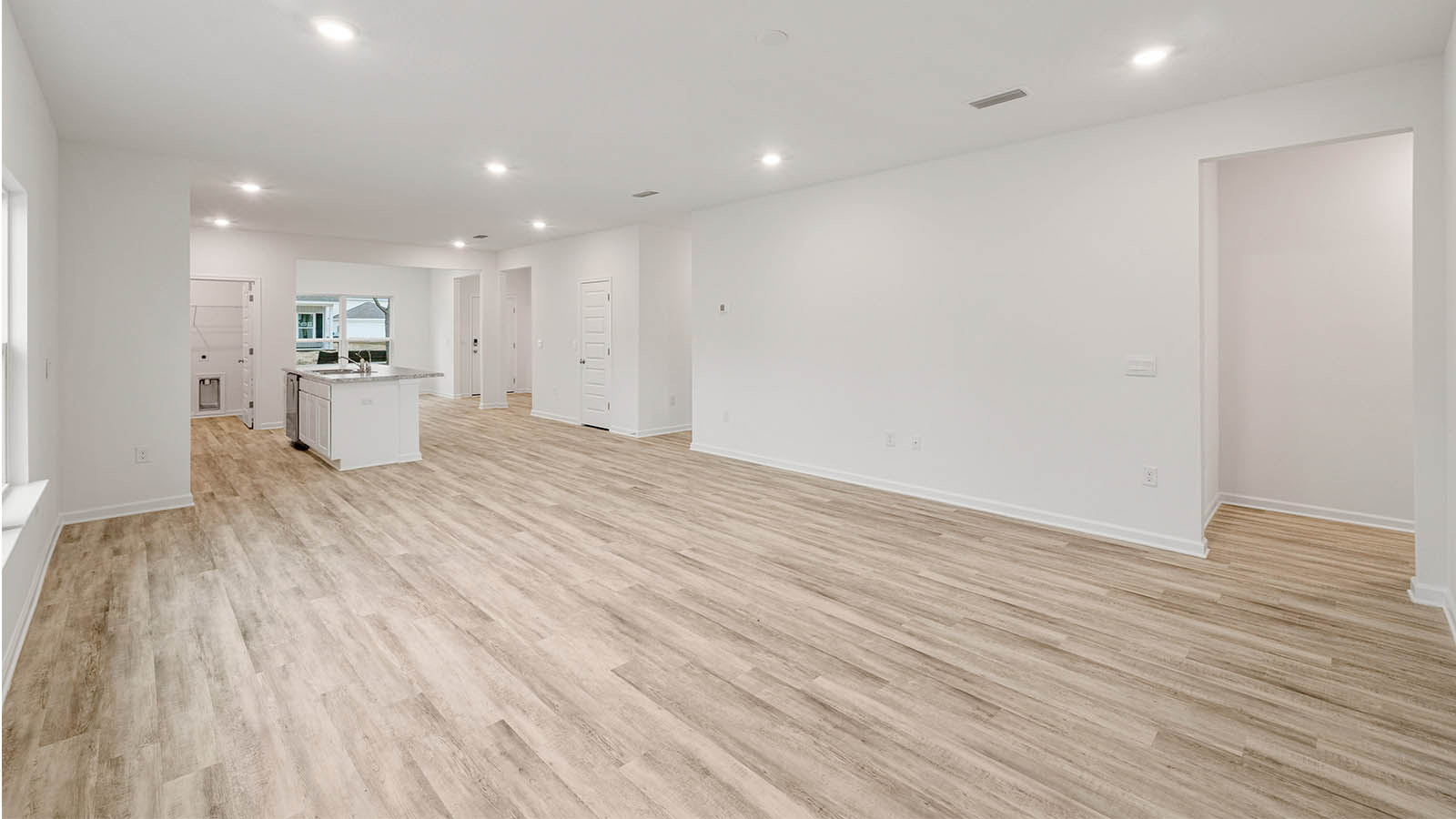 The open living area to the kitchen allow for entertaining and visiting with friends and family