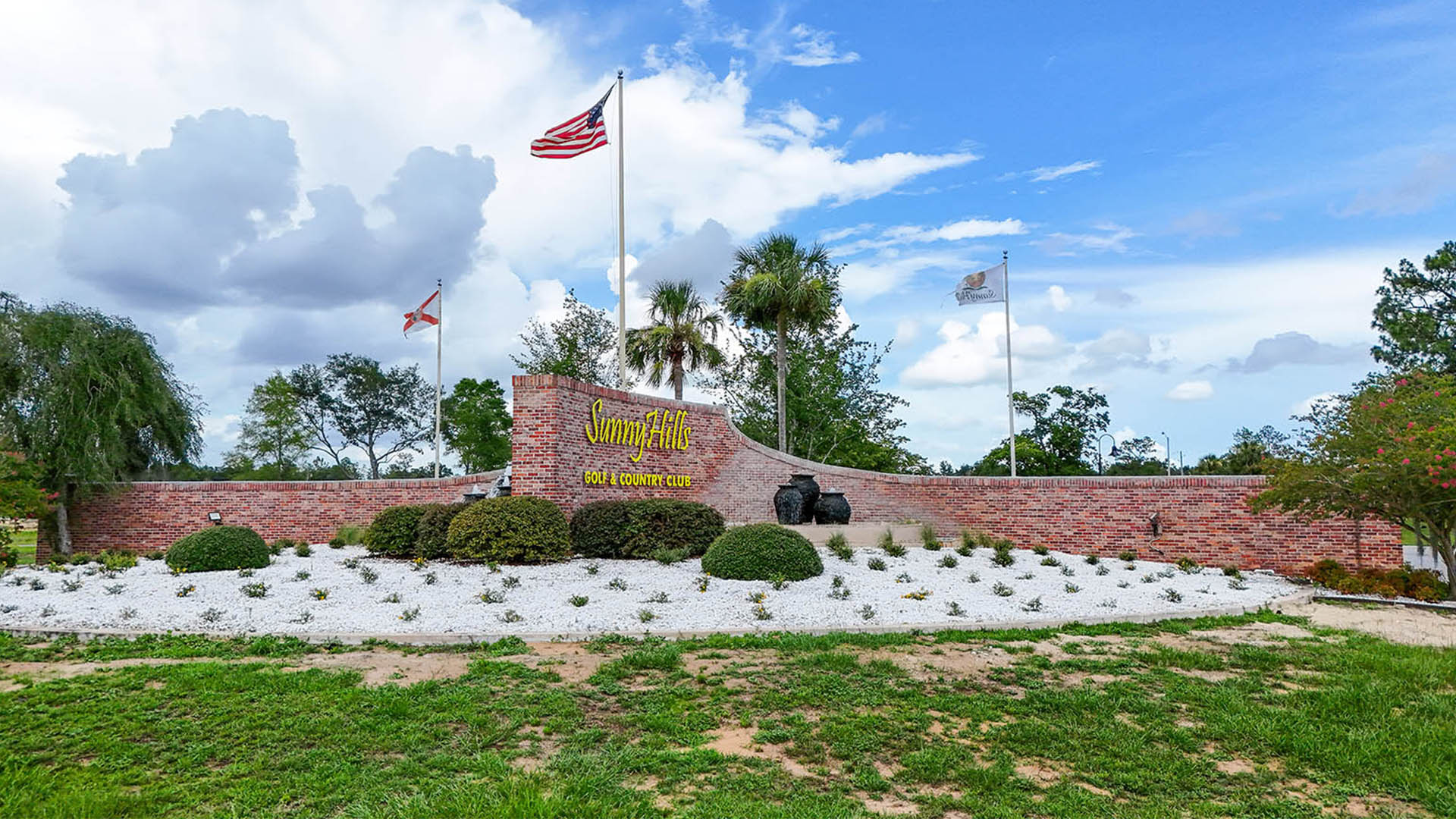 Sunny Hills community features ponds, a golf course and boat launch