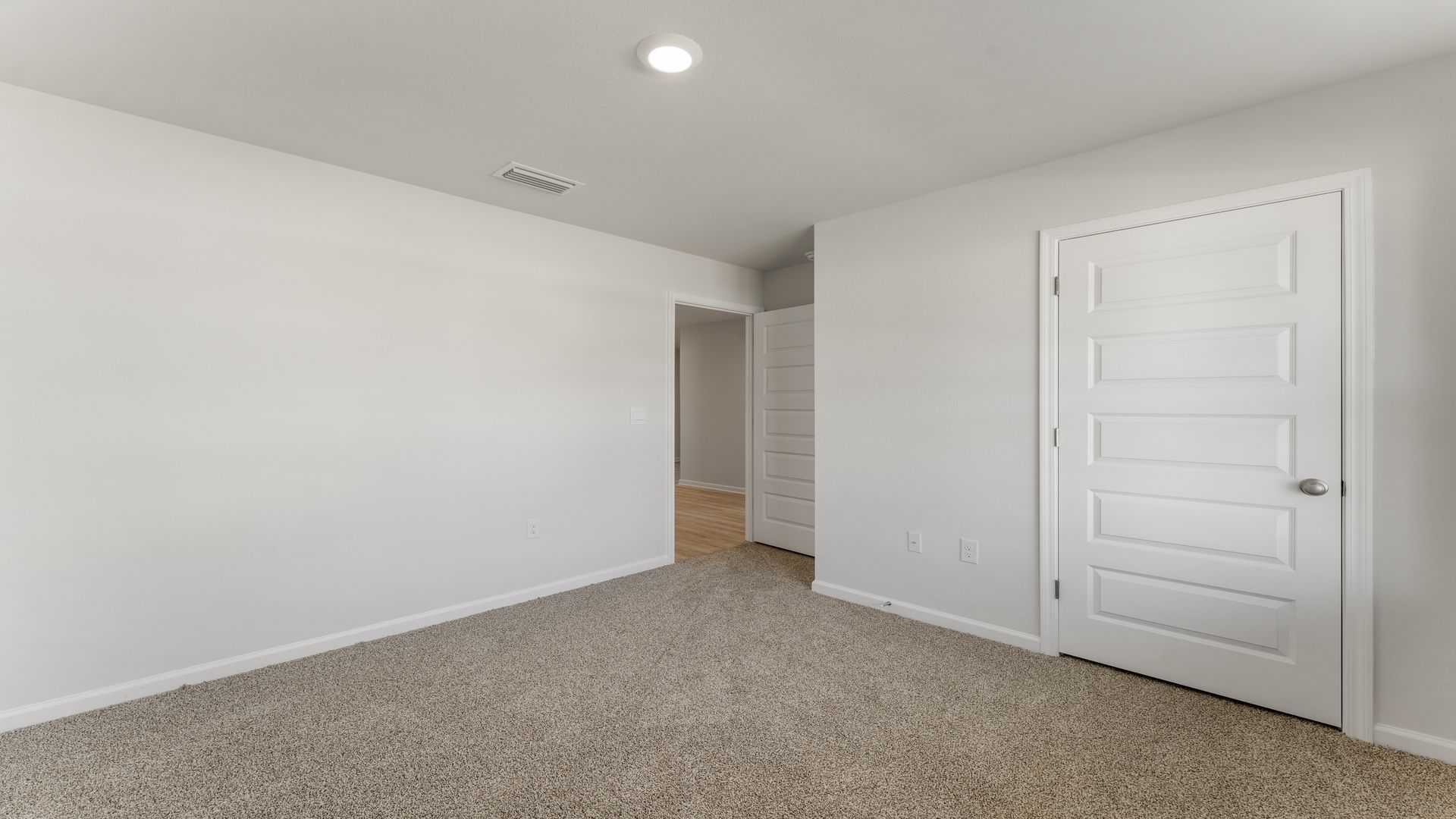 Bedroom two has carpet and ample closet space