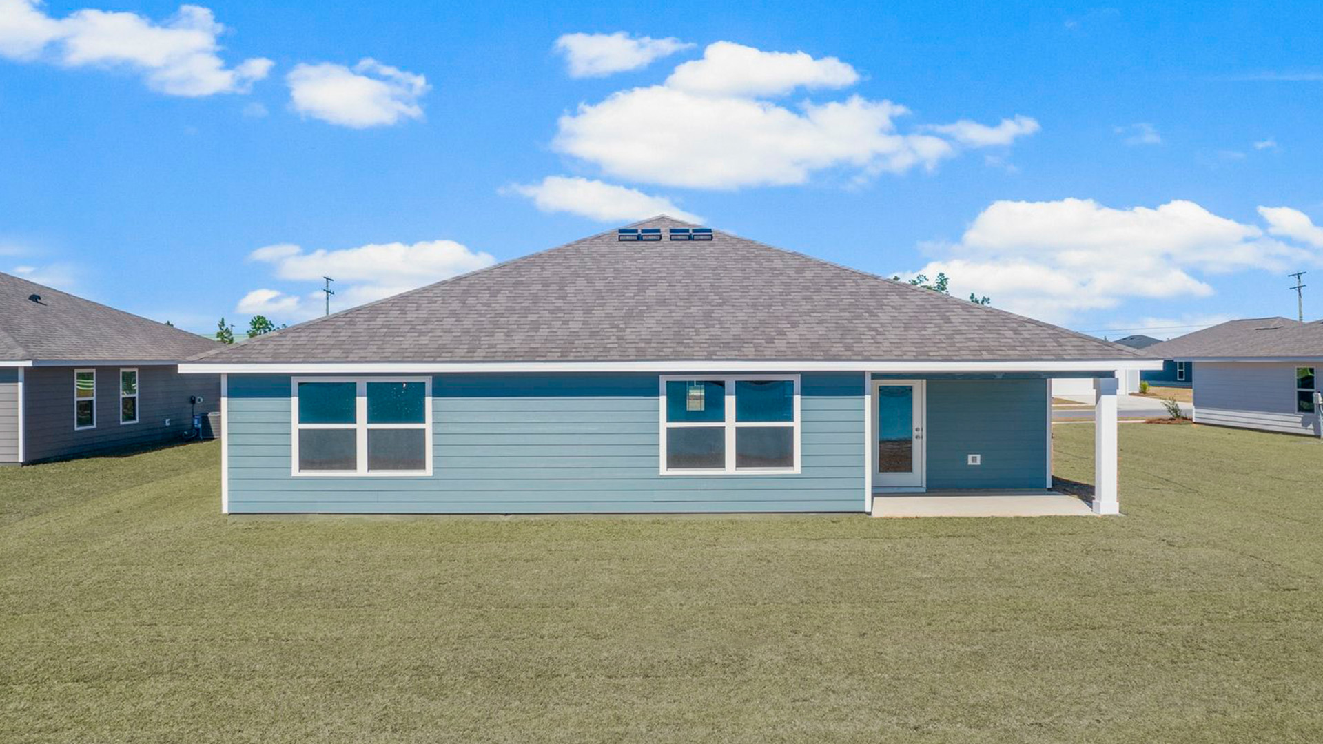 The Cali features a covered patio at the back of the home