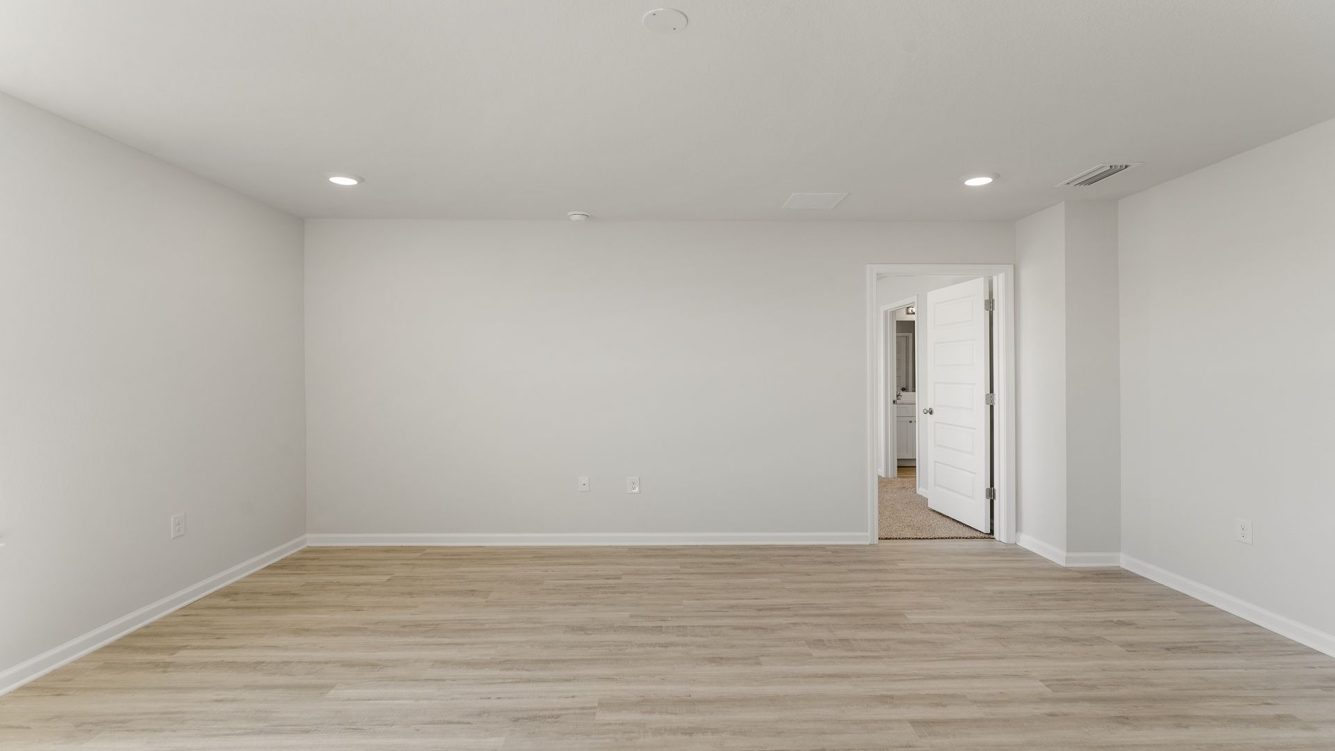 The primary bedroom is off the living room