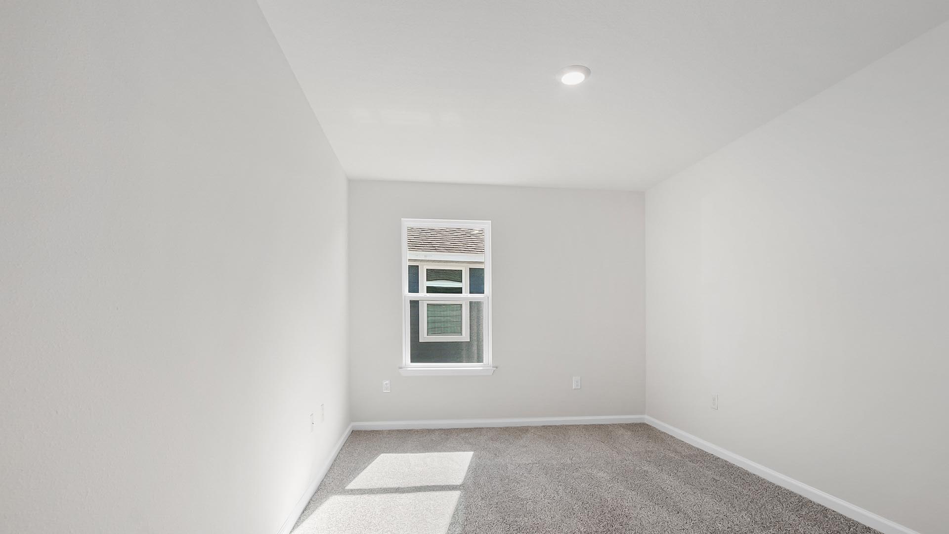 Bedroom three is located off the entry hall