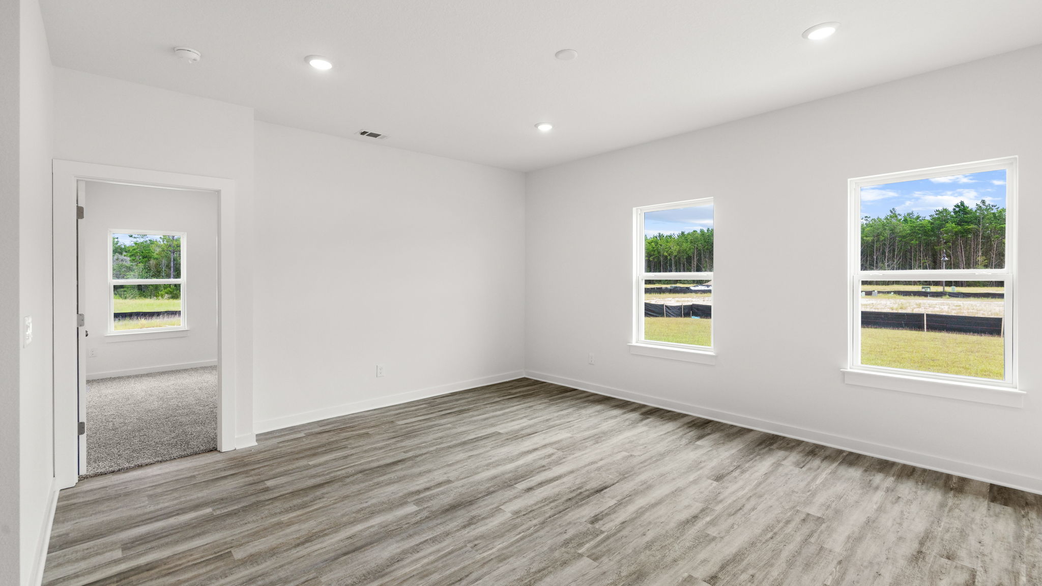 This living area has windows for natural light