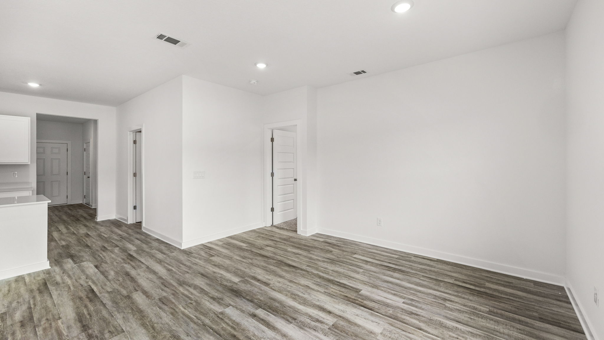The primary bedroom is located of the living area