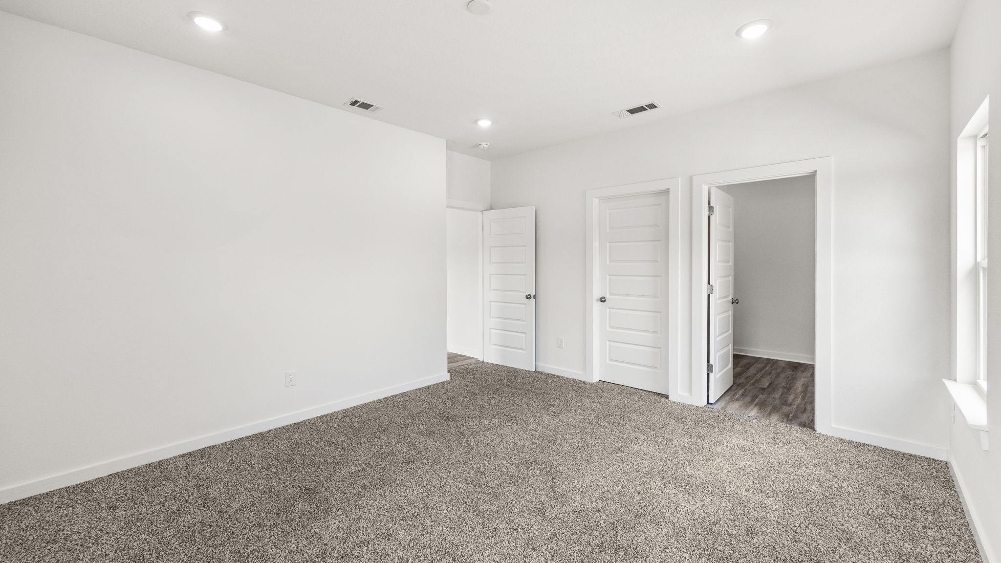 The primary bedroom has a walk-in closet
