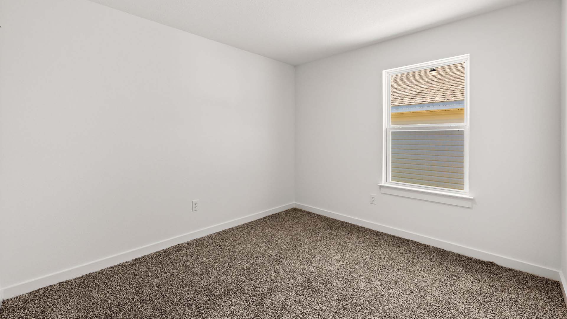 Guest bedroom two with ample closet space