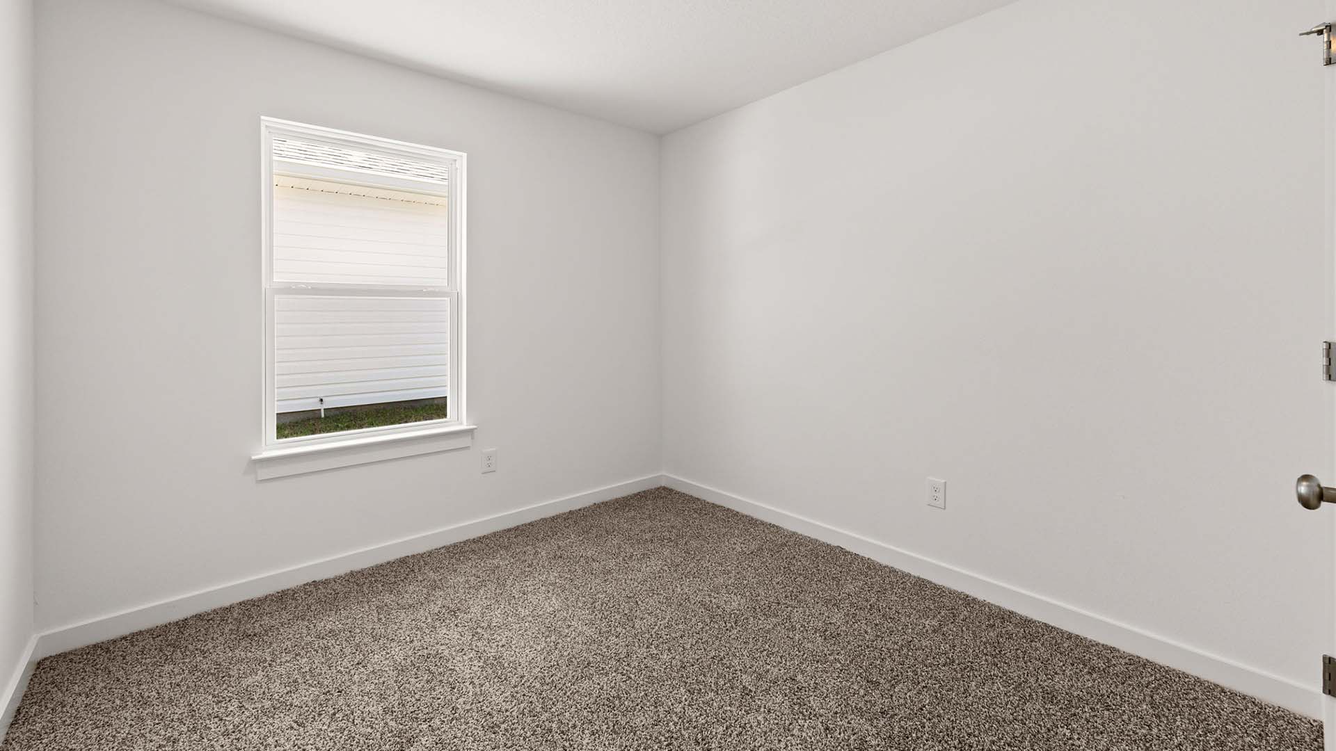 Guest bedroom three has carpet