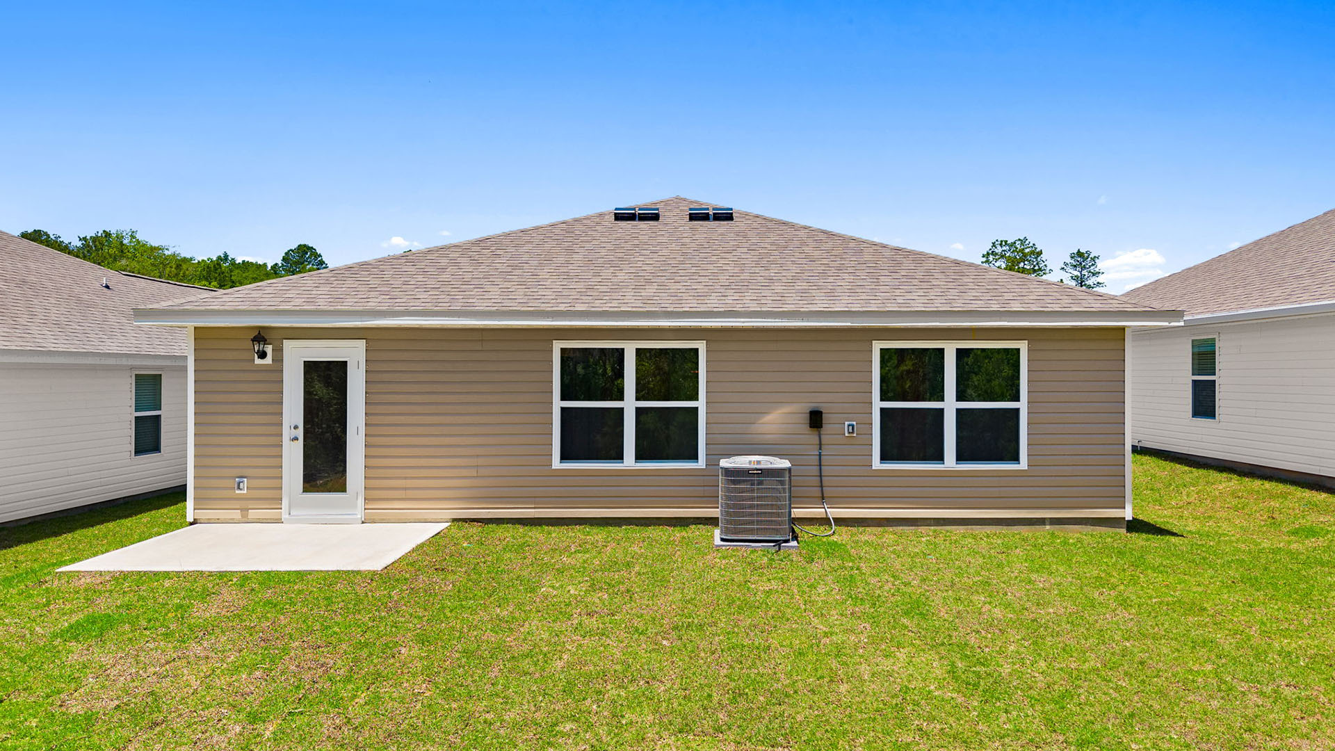 There is an open patio at the back of the home