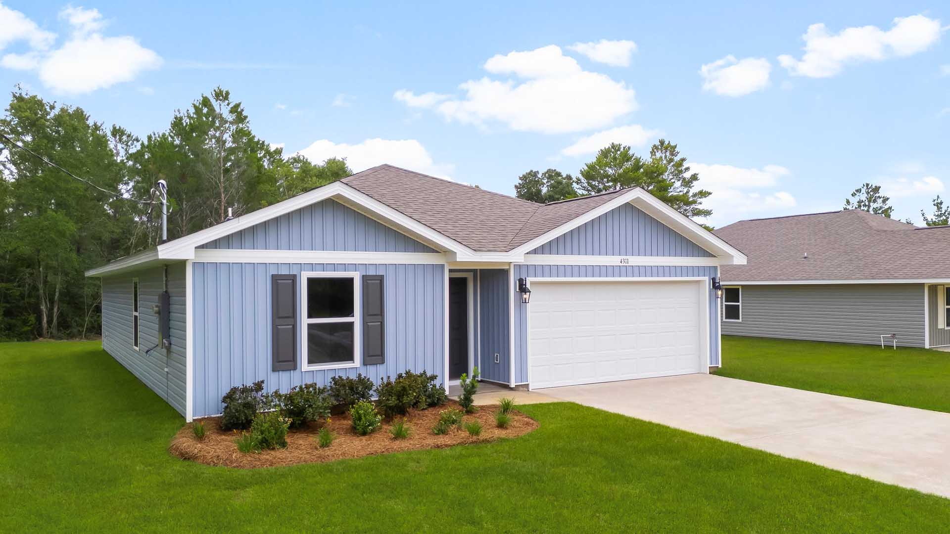 The Freeport has four bedrooms two bathrooms and a two car garage