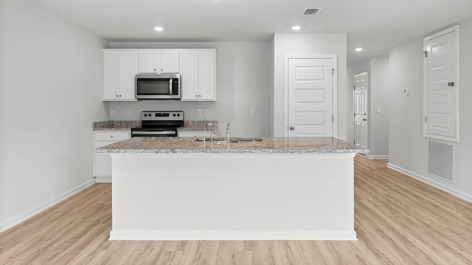 Kitchen with center island and space for seating