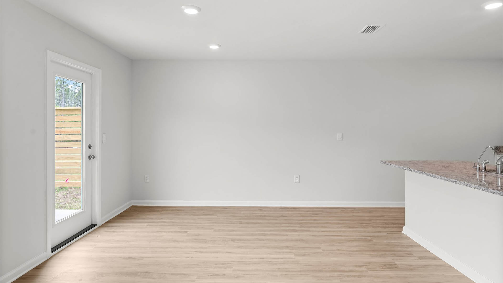 The dining area is open to the kitchen