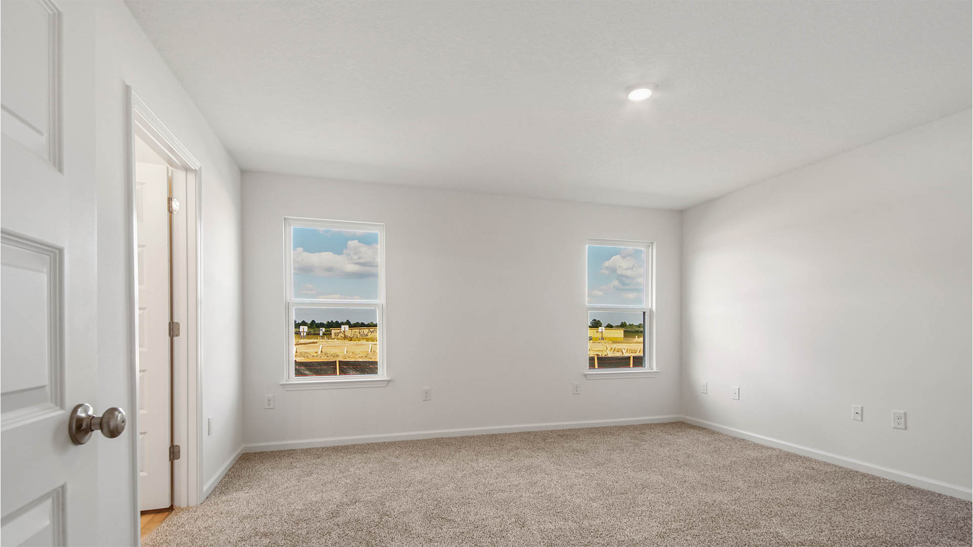Primary bedroom retreat is located off the living room