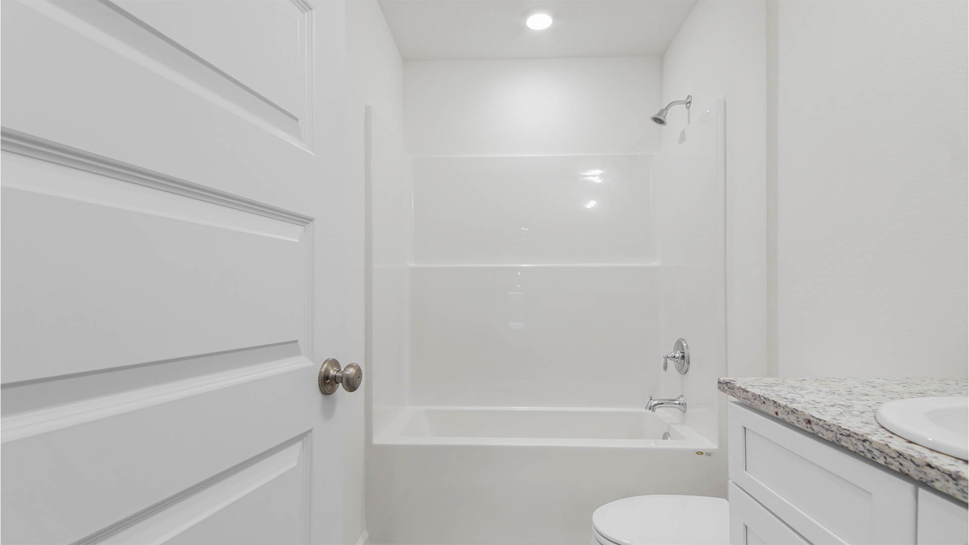 Shared bathroom number one with shower tub combination