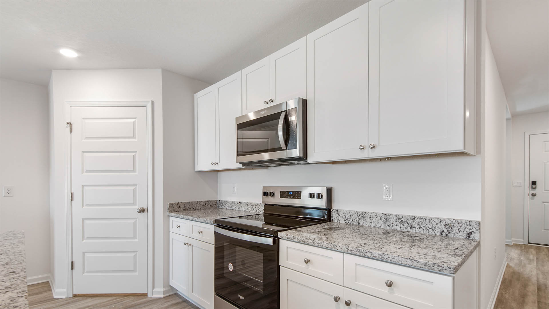 Abundant cabinetry above and below for storage