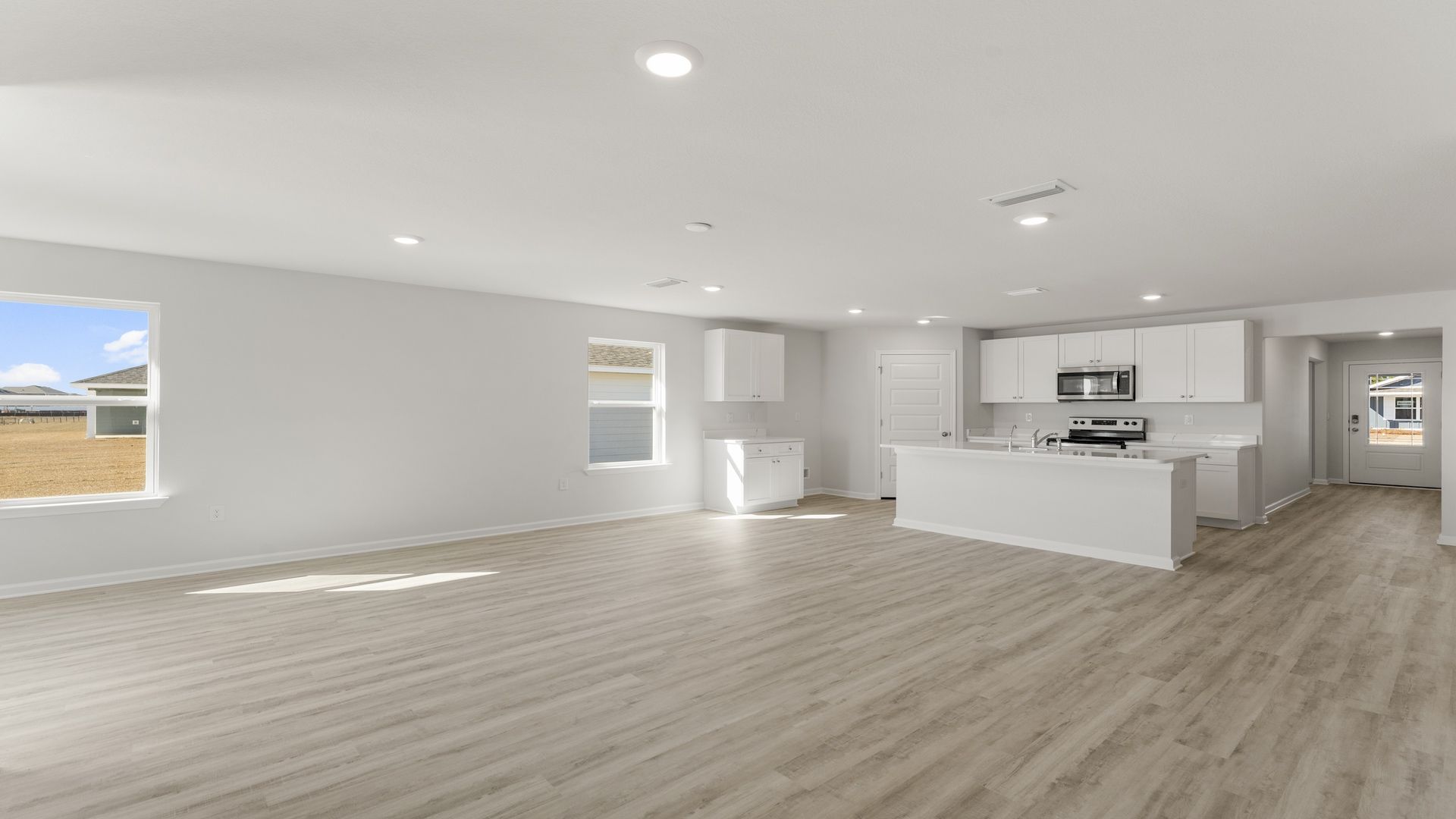 The open concept design creates a spacious place for guests or family