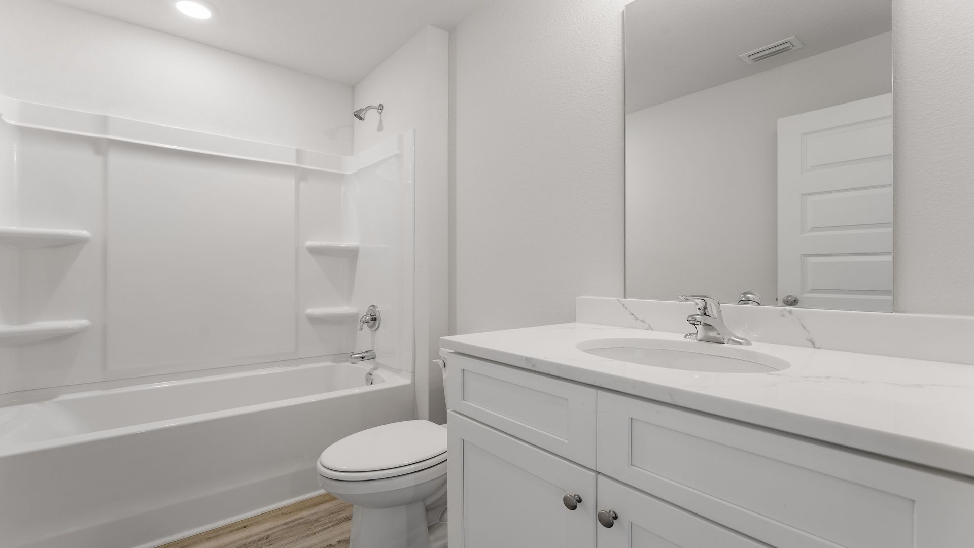 Shared bathroom one with single basin sink and shower tub combination