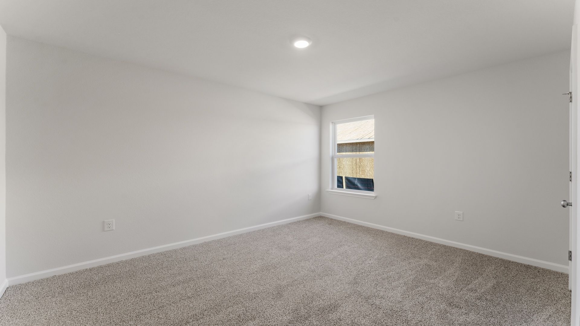 Guest bedroom four with carpet