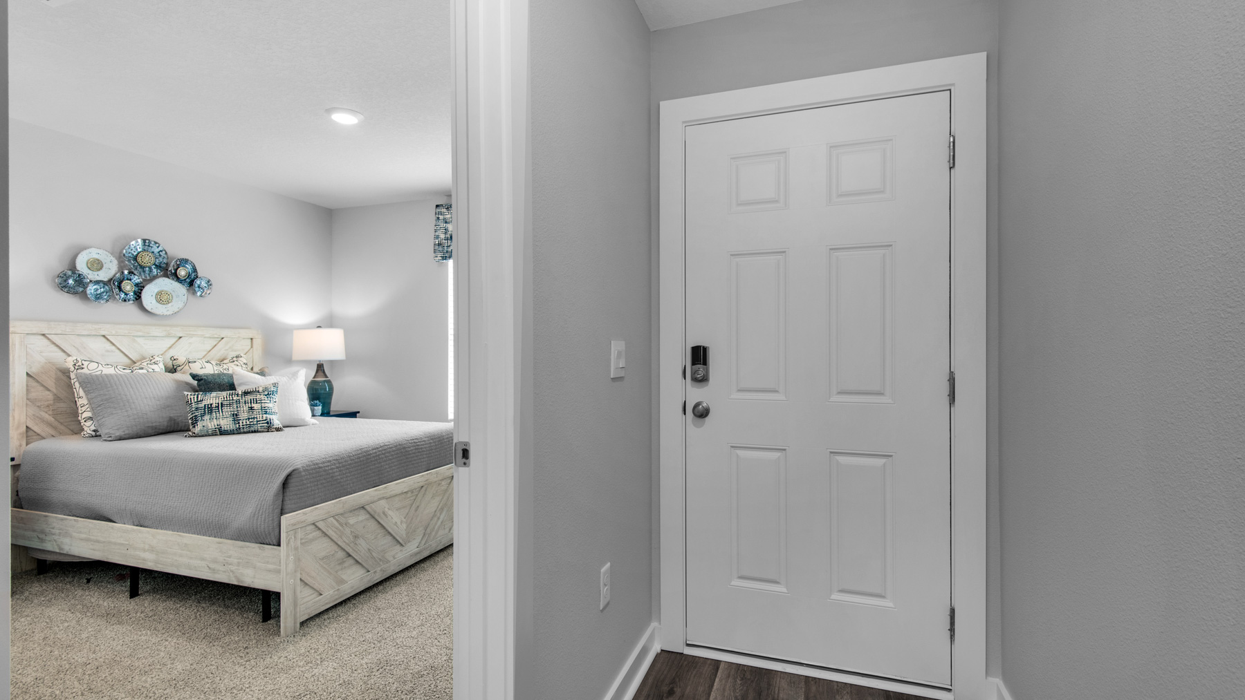 There are two bedrooms off the front entry hall