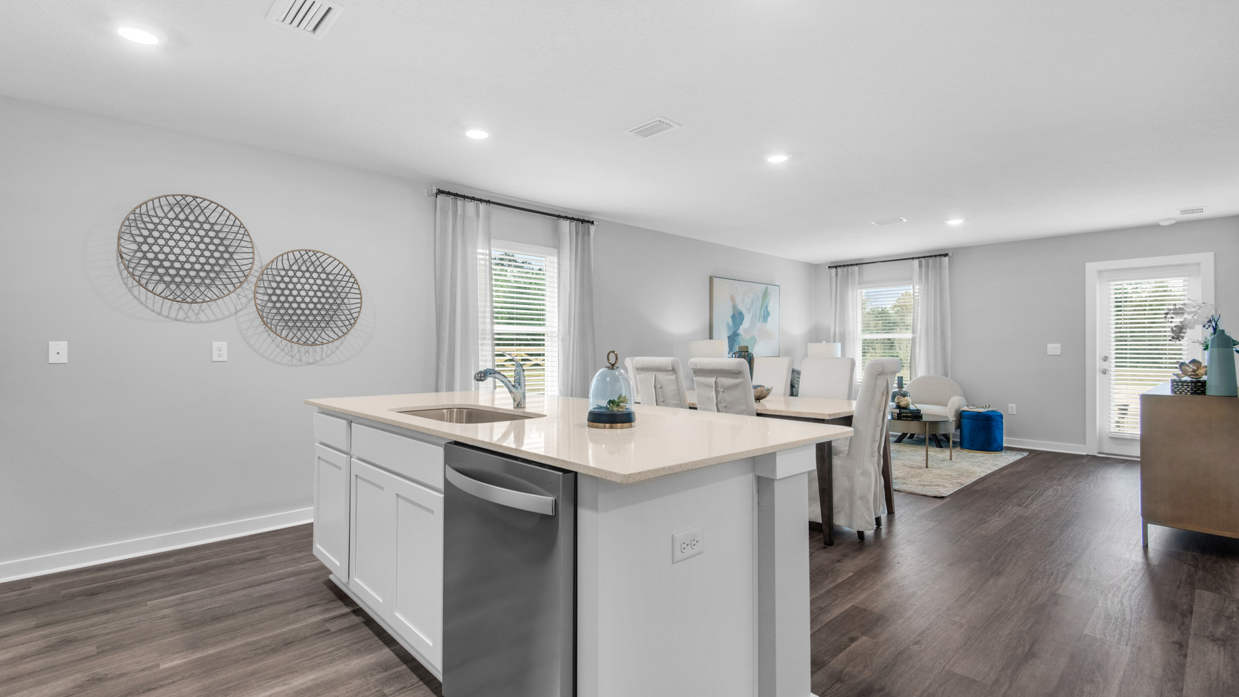 The kitchen is open to the living area and has a center island