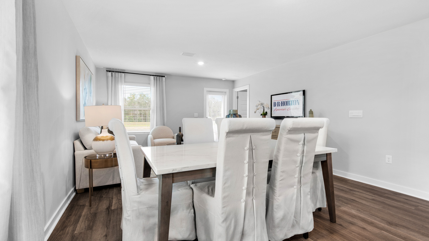 The dining area has windows allowing for natural light
