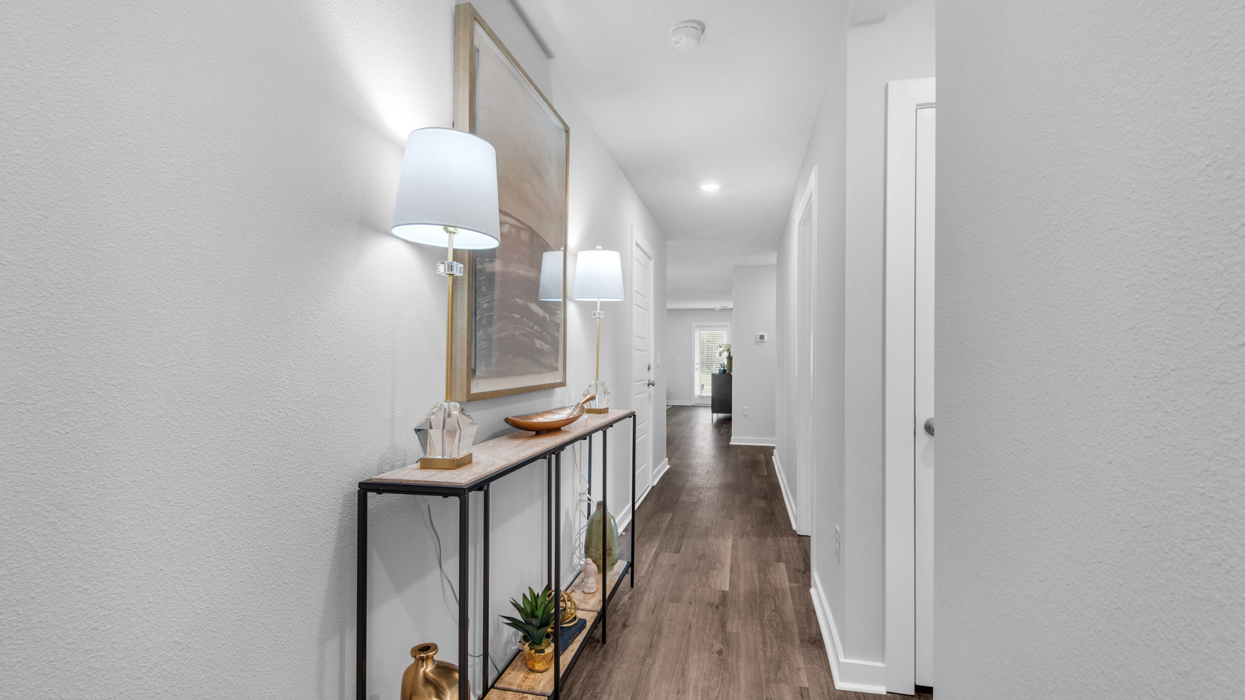 The entry hall leads to the open concept living area