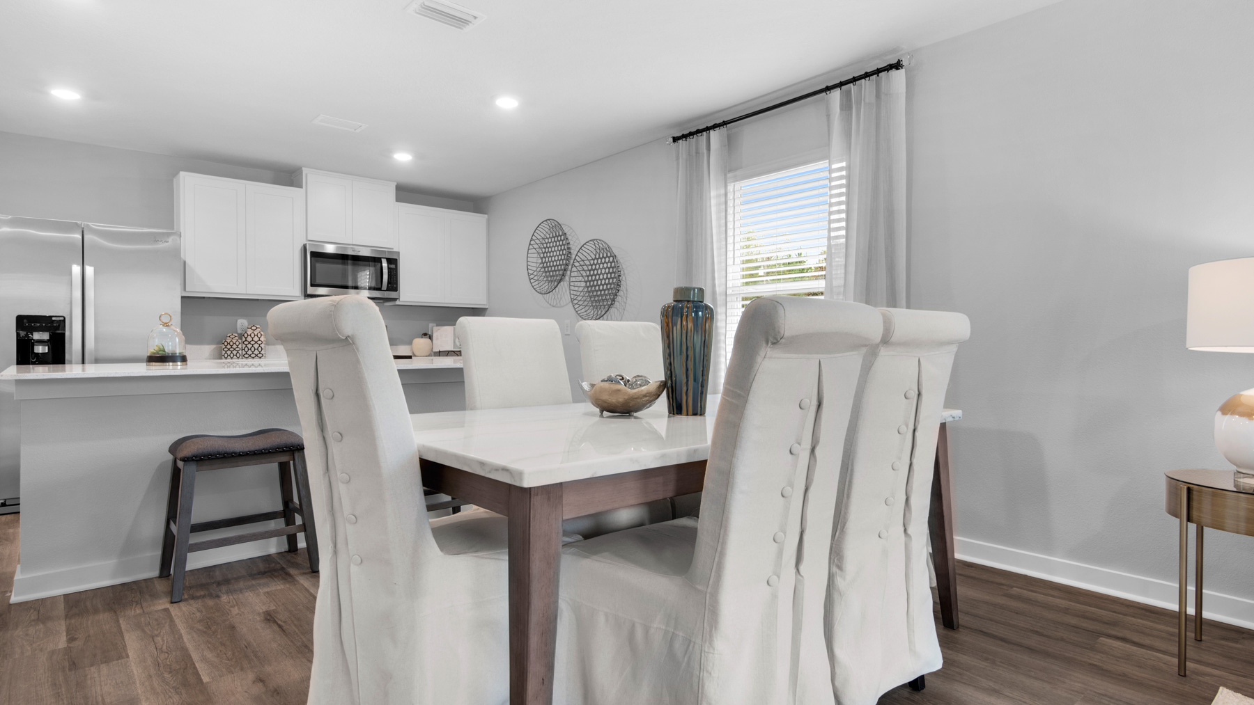 This image shows the dining area to the open kitchen