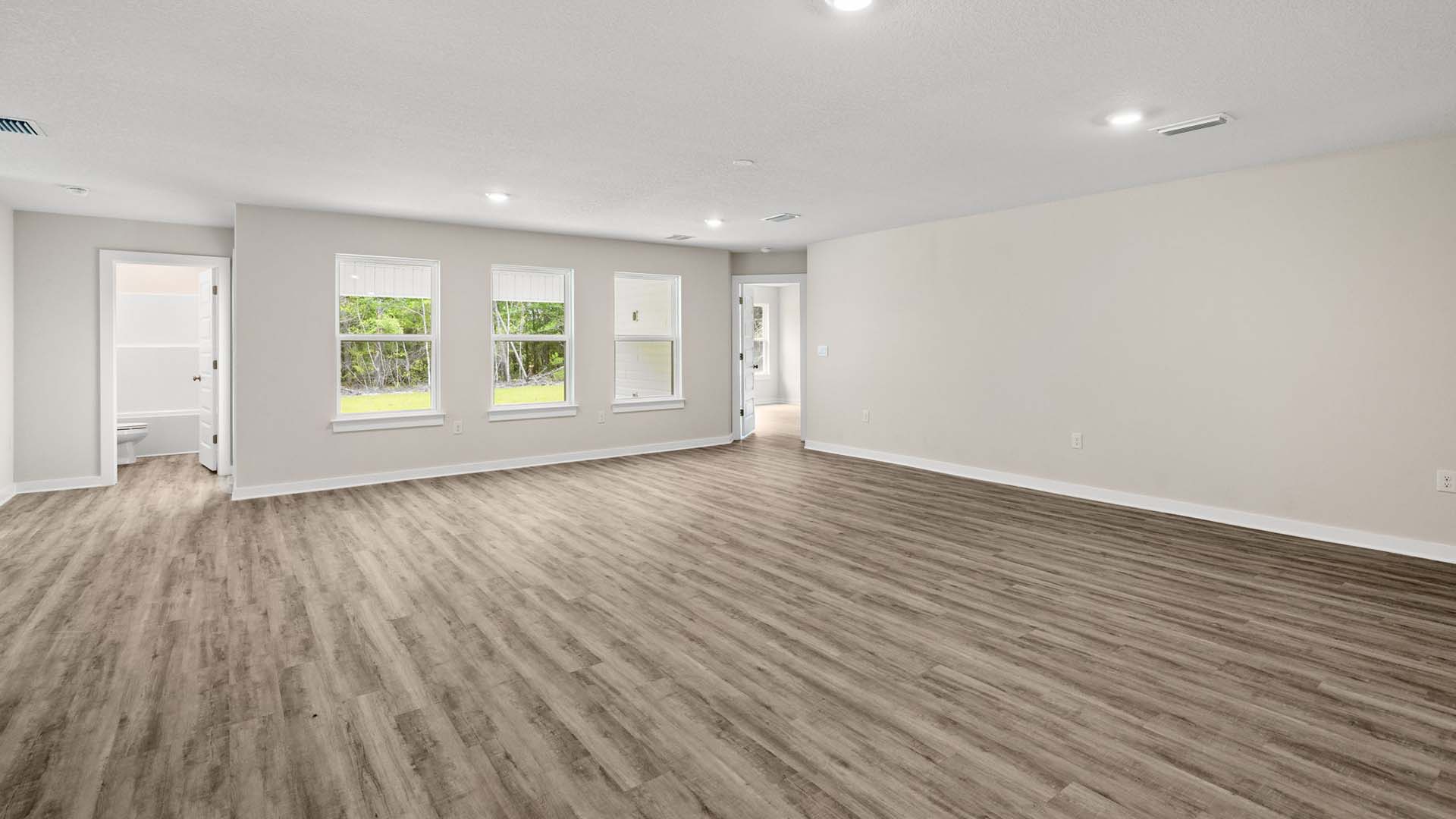 There is a full bathroom and guest bedroom off the dining/living area