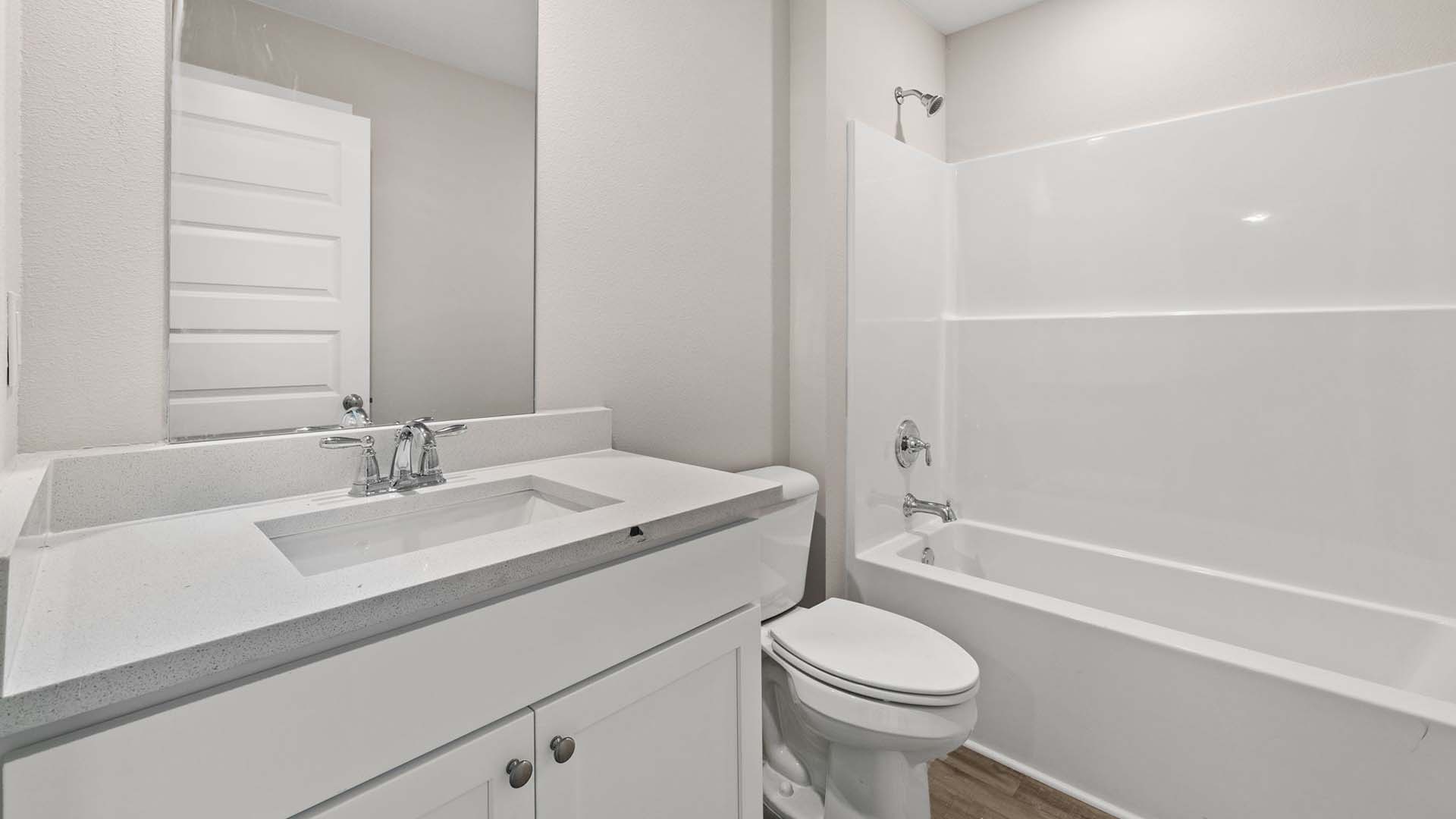 The shared bathrooms have a shower tub combination in each