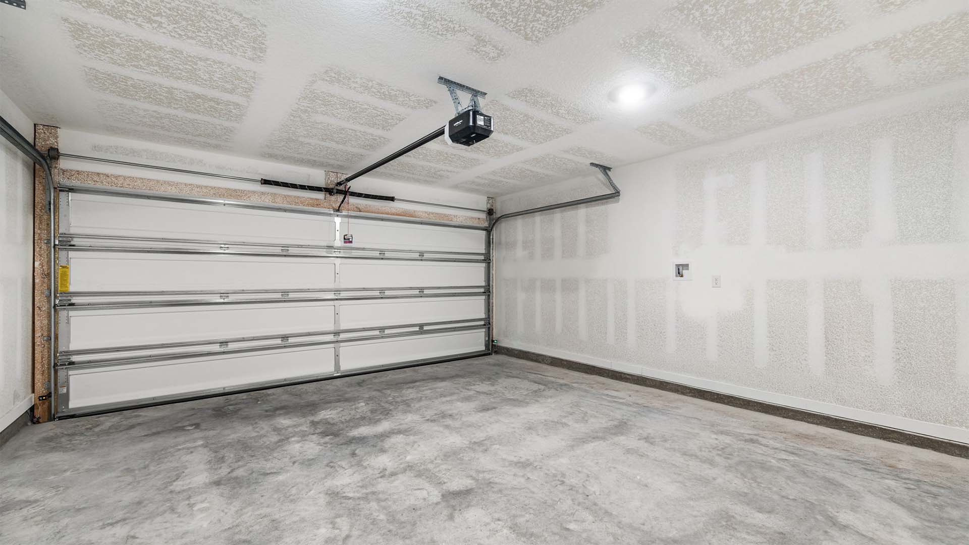 The garage has space for two cars and has remote access