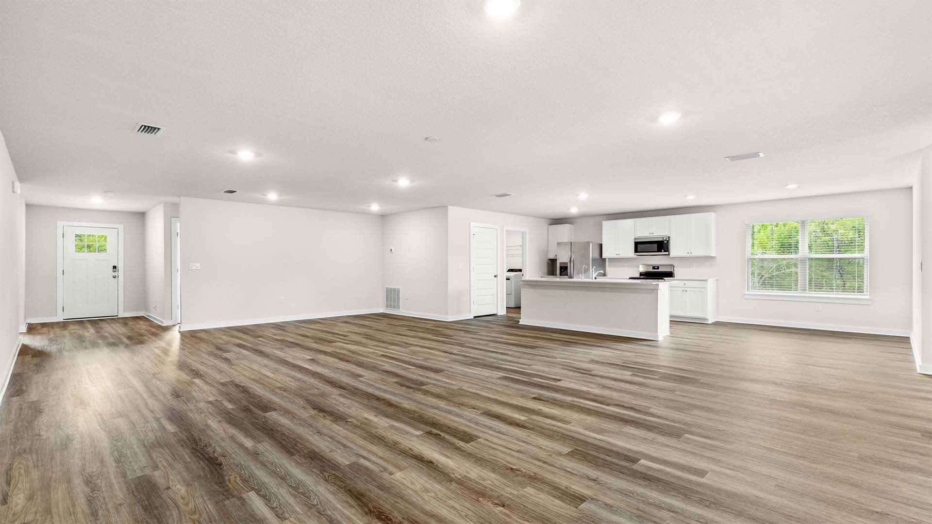 This open concept design has space for a formal dining area a breakfast area and living area
